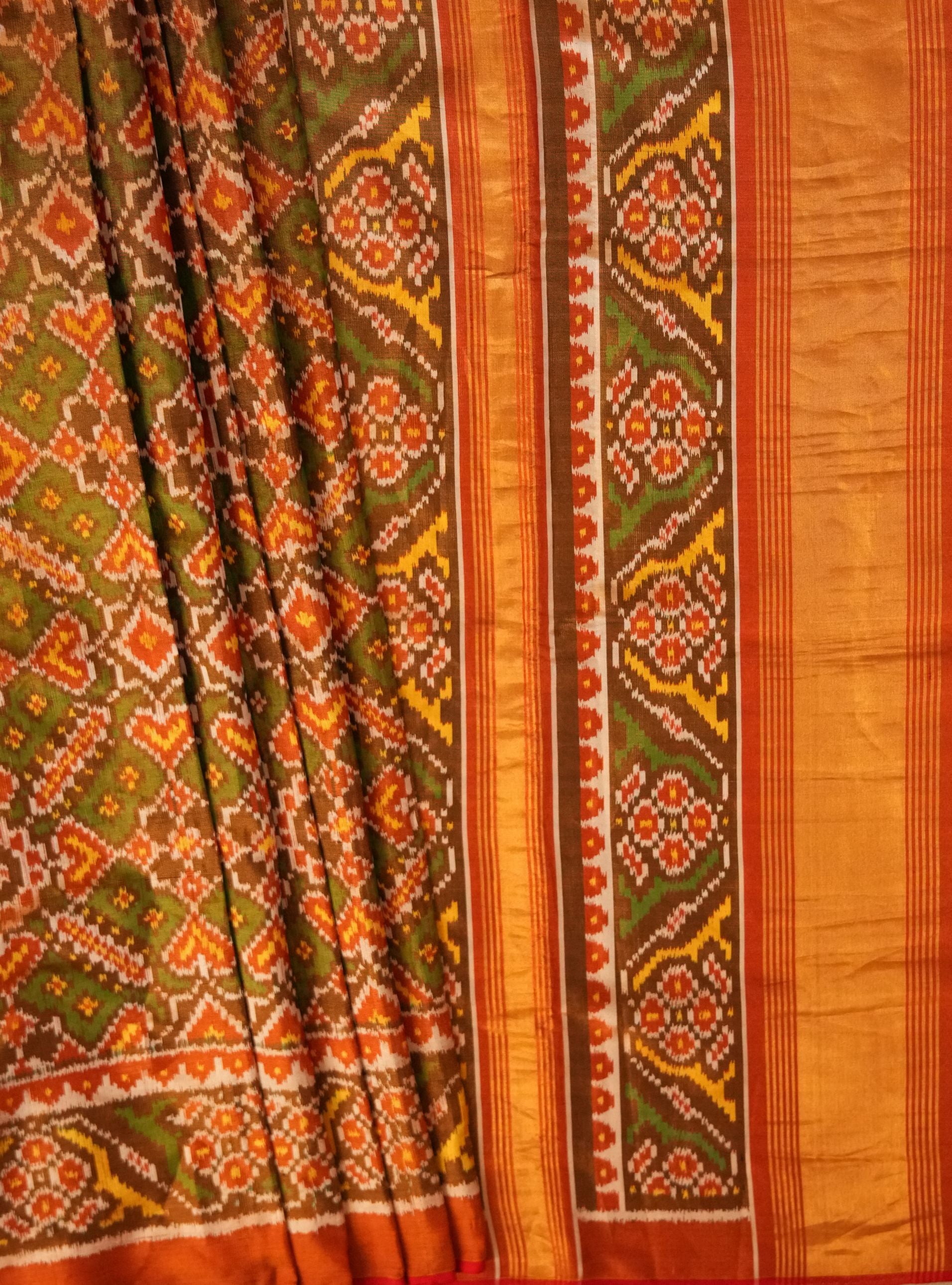 Mandakini Dark Green Tissue Patola Saree