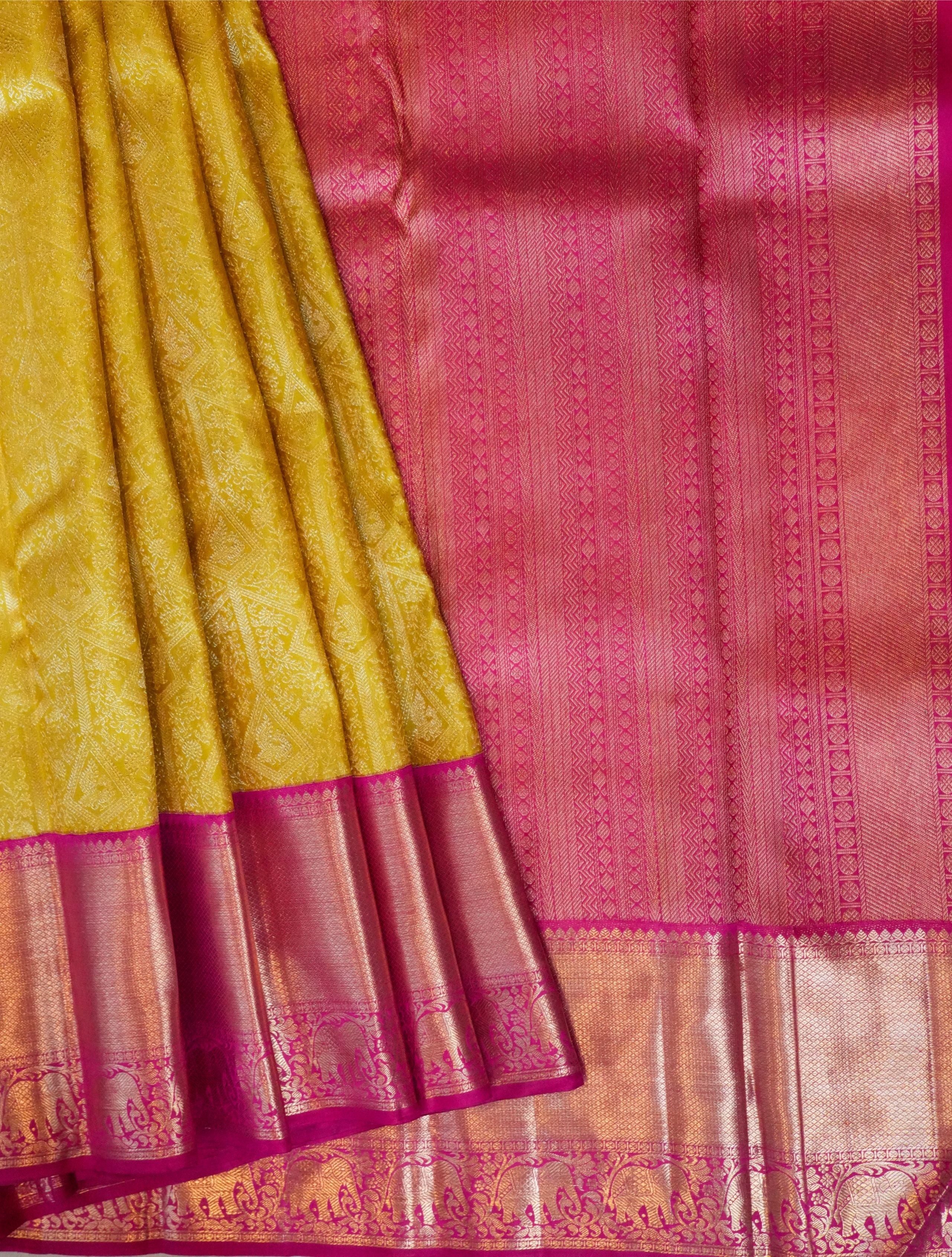 Yellow Gold Kanchi Pattu saree with Pink border