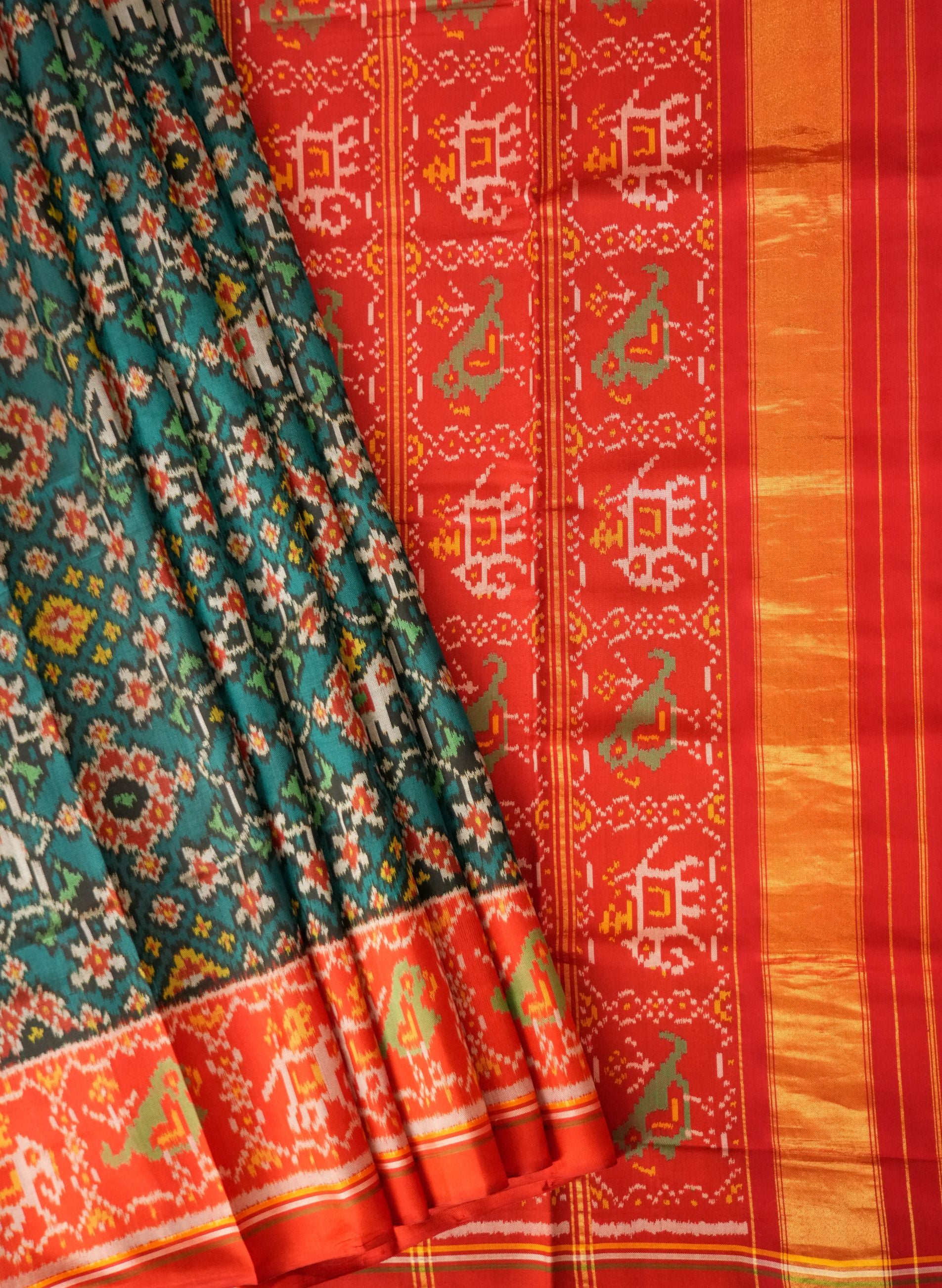 Utsava Green & Red Patola Saree