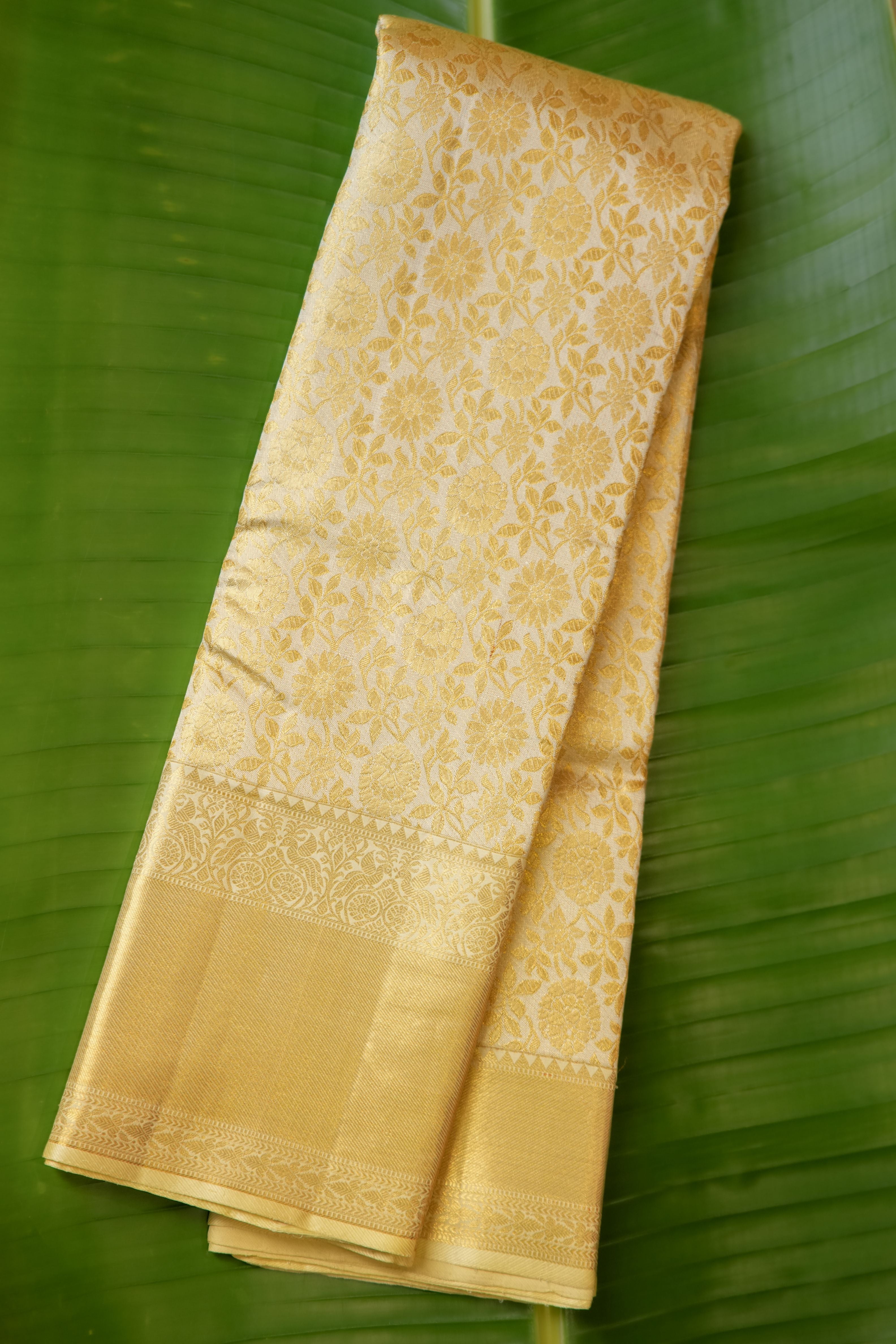 Kavacha Gold Tissue Floral Saree