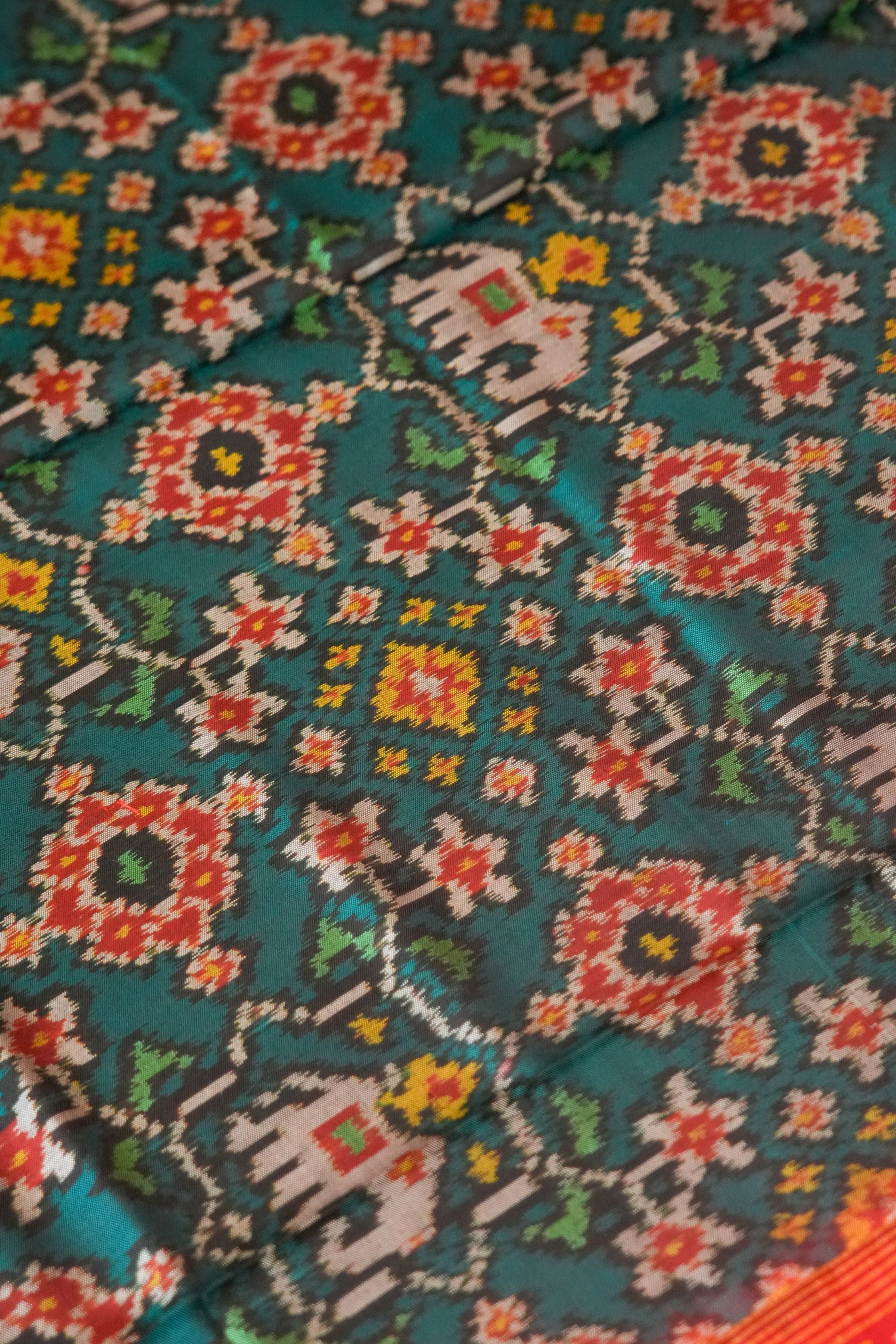 Utsava Green & Red Patola Saree