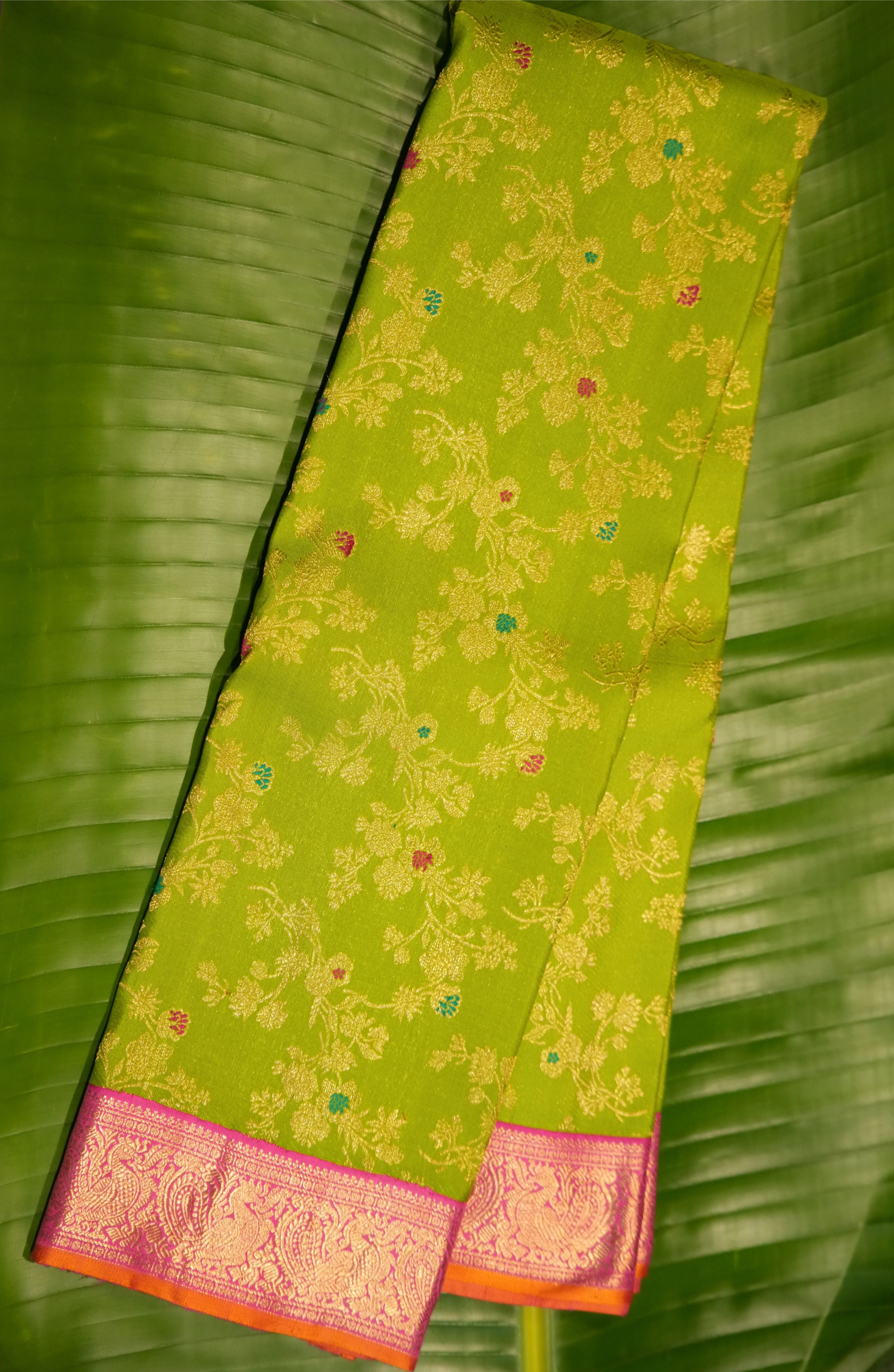 Parrot Green Floral Kanchi Saree with Contrast Pink Border