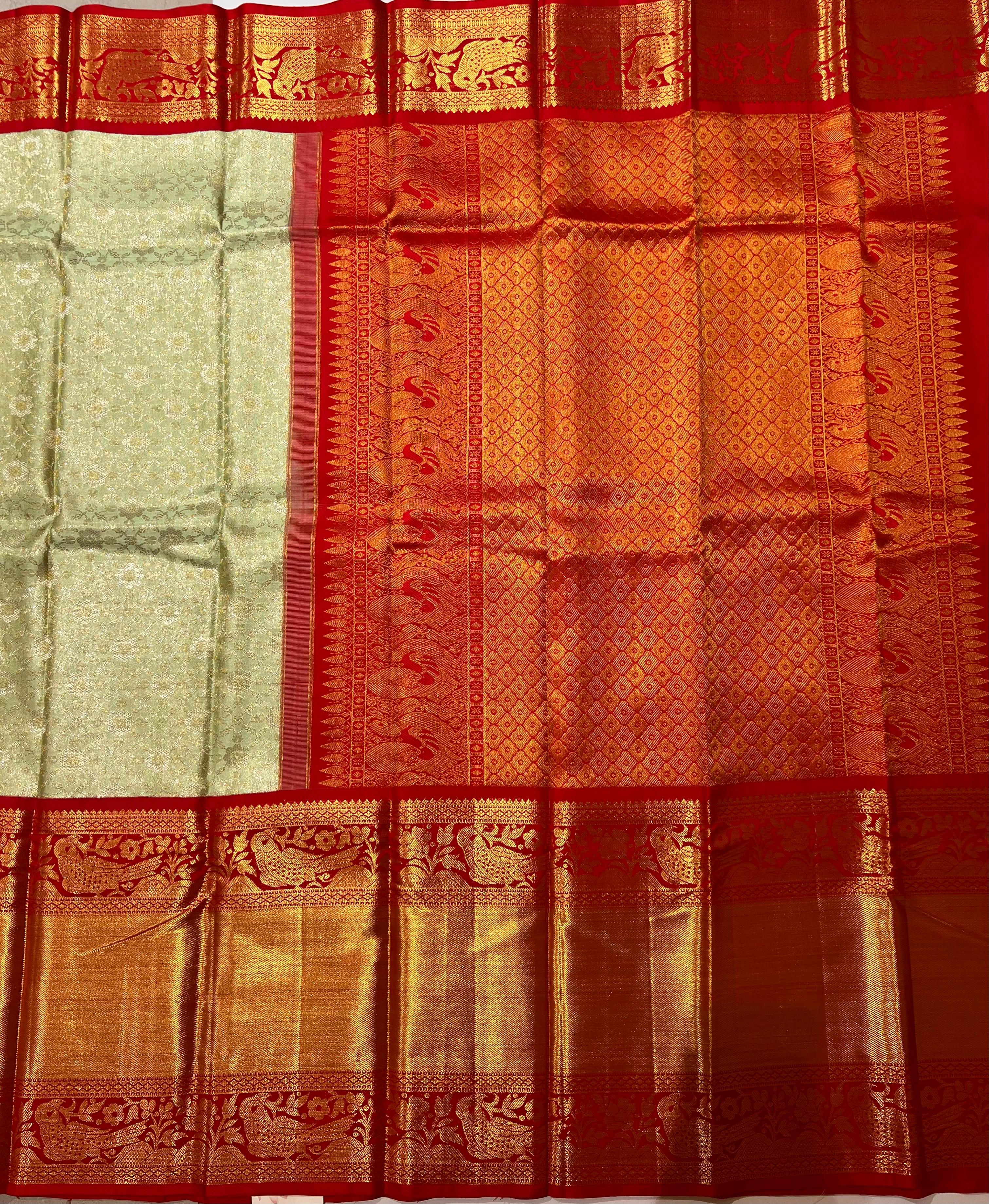 Light green and gorgeous red Kanjeevaram silk saree