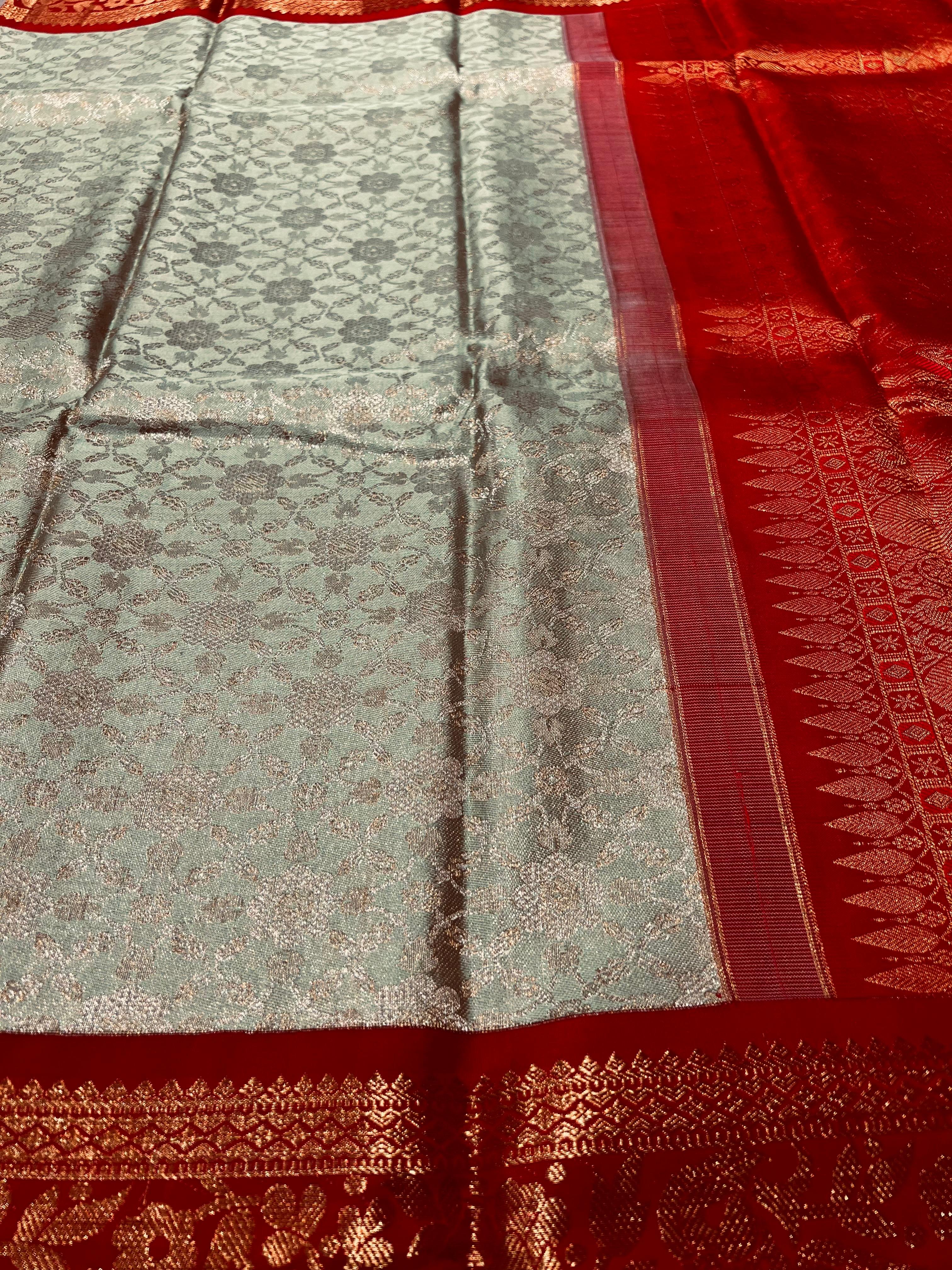 Light green and gorgeous red Kanjeevaram silk saree