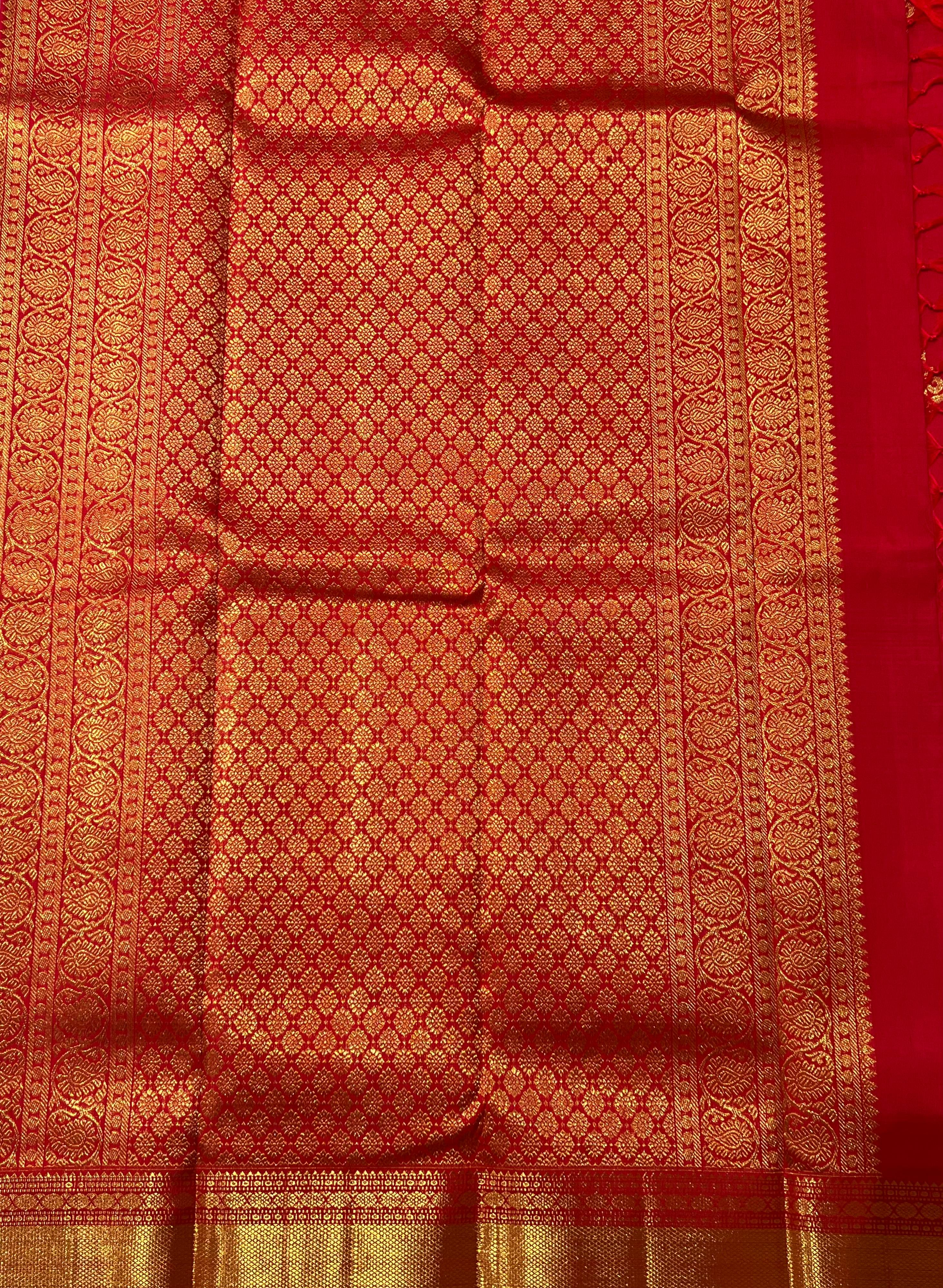 Floral butis Butis Red and golden Kanjeevaram saree