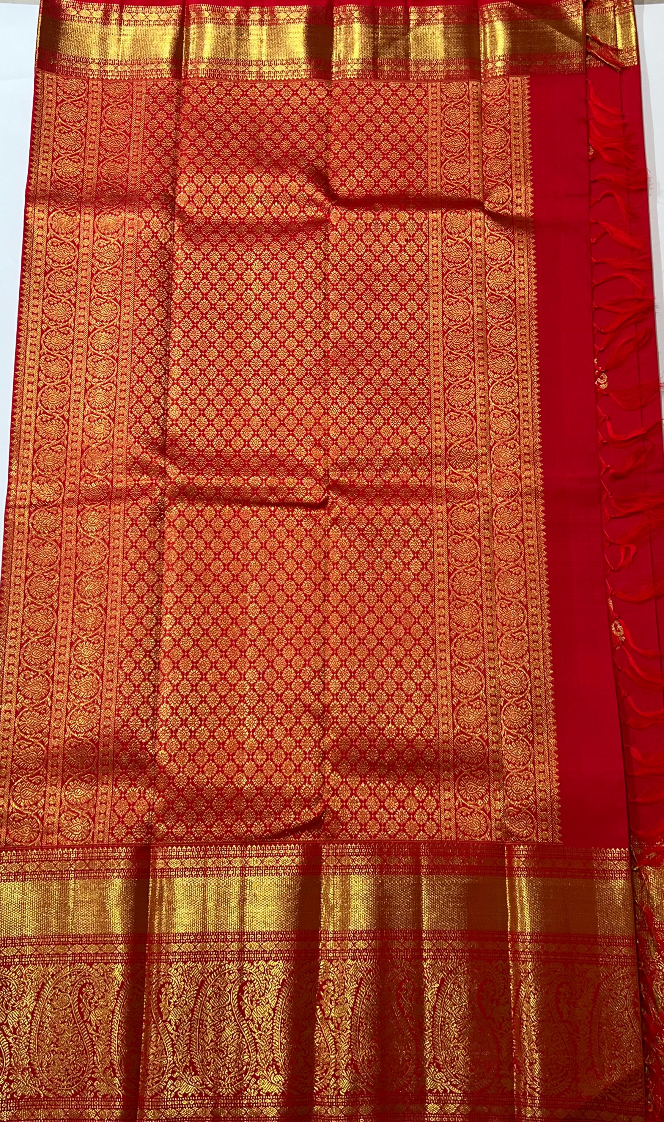 Floral butis Butis Red and golden Kanjeevaram saree