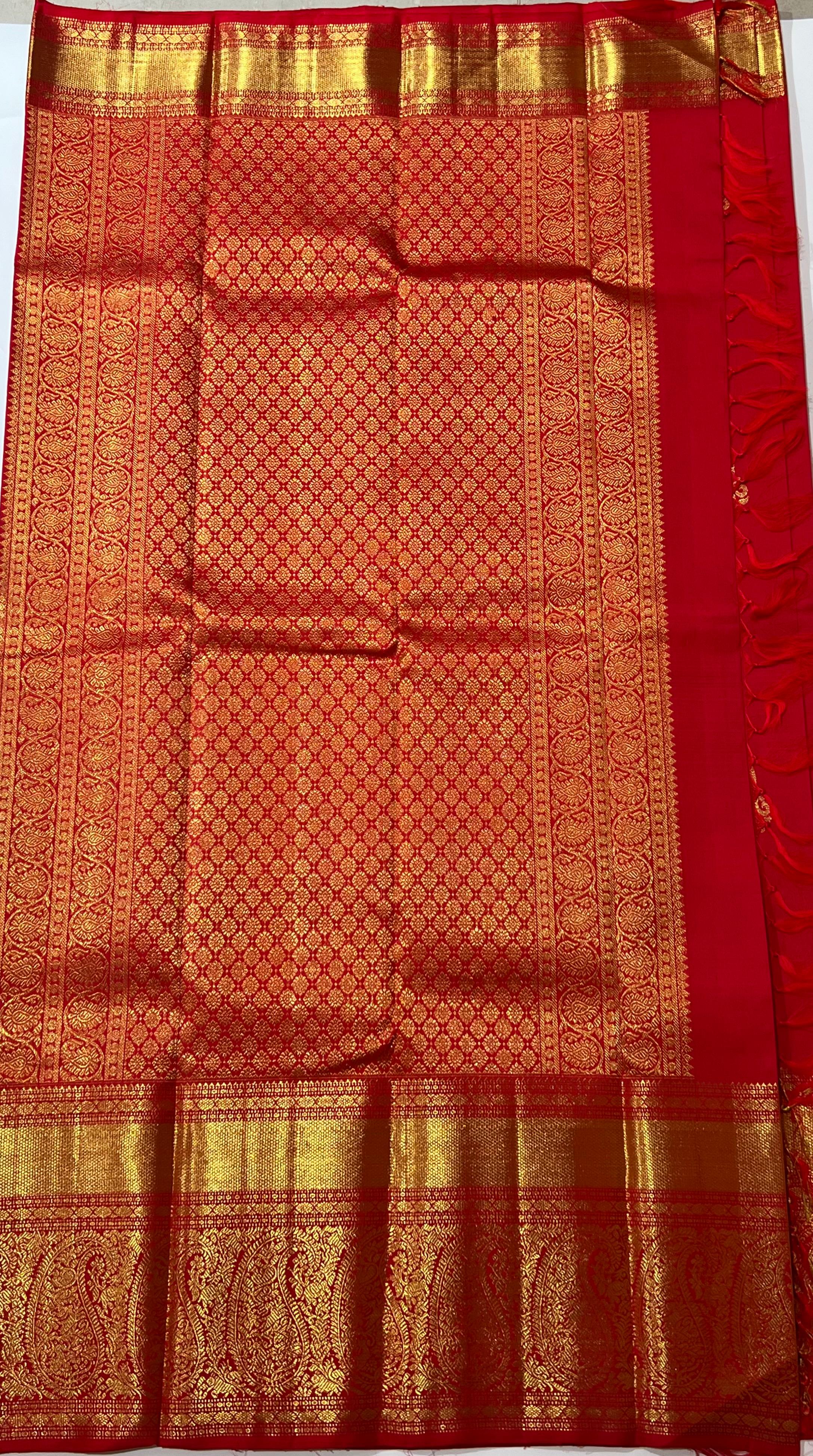 Floral butis Butis Red and golden Kanjeevaram saree