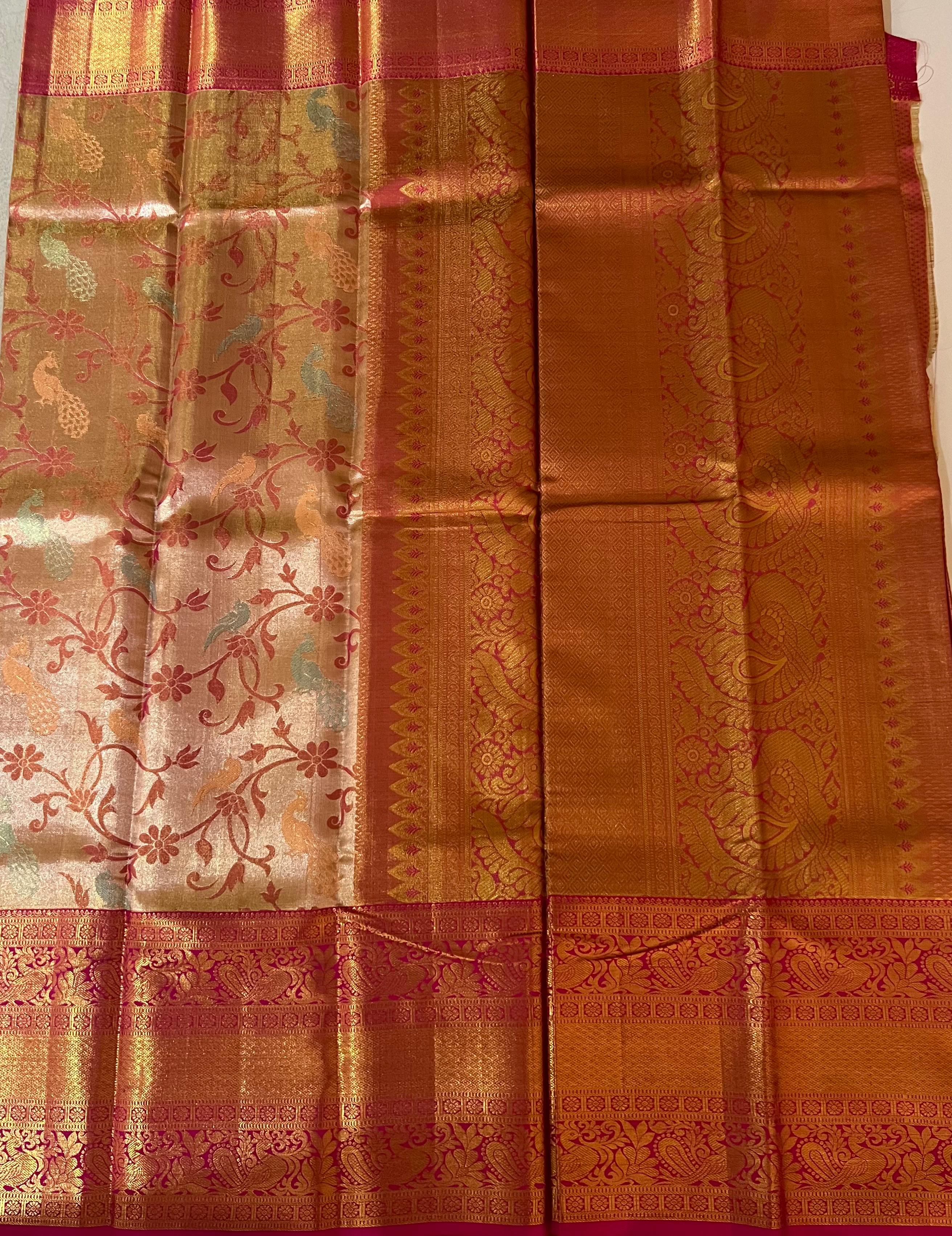 Peacock motif Golden and rani pink Kanjeevaram silk saree