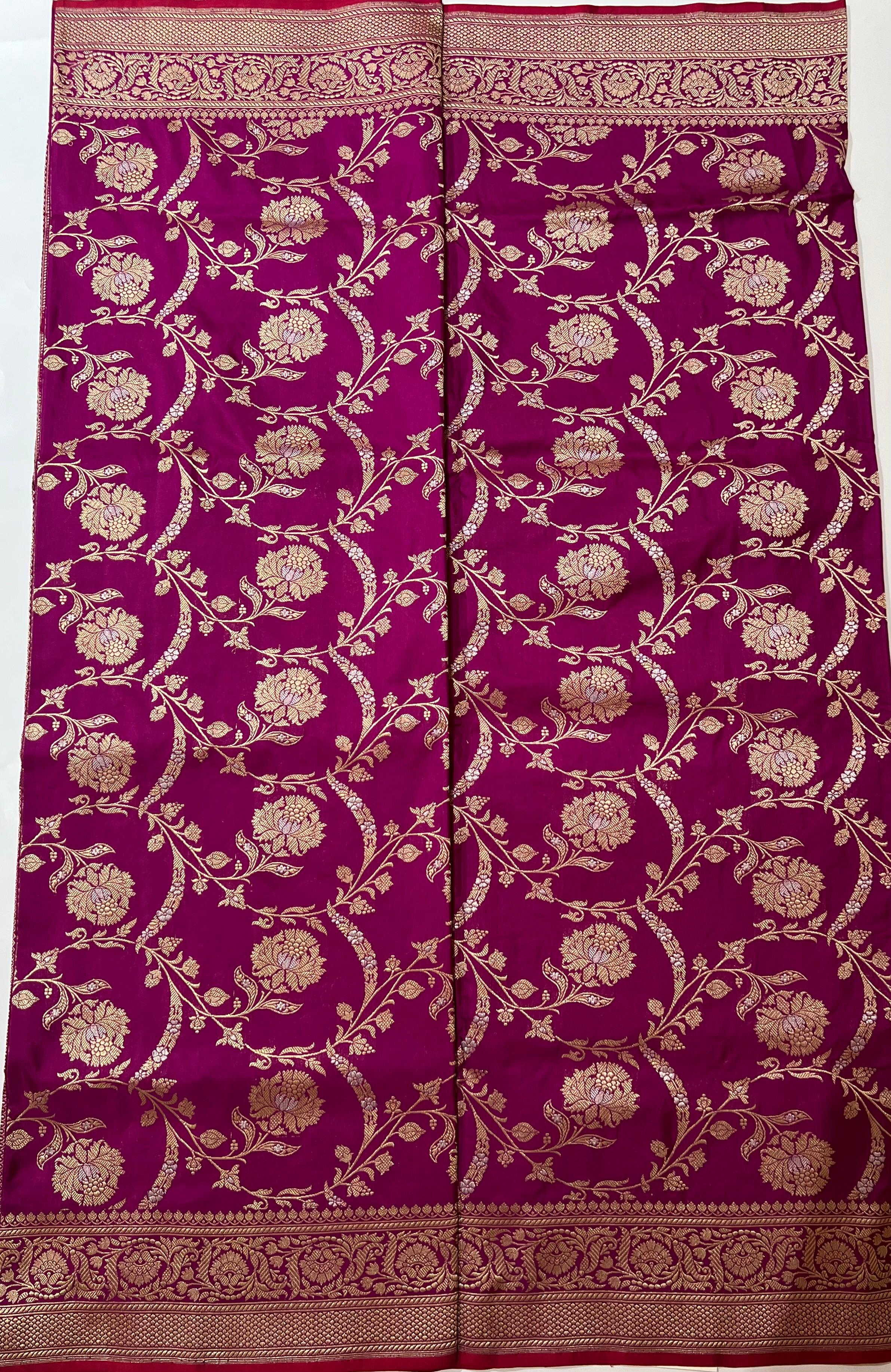 Zari work on rani pink Banarasi Saree