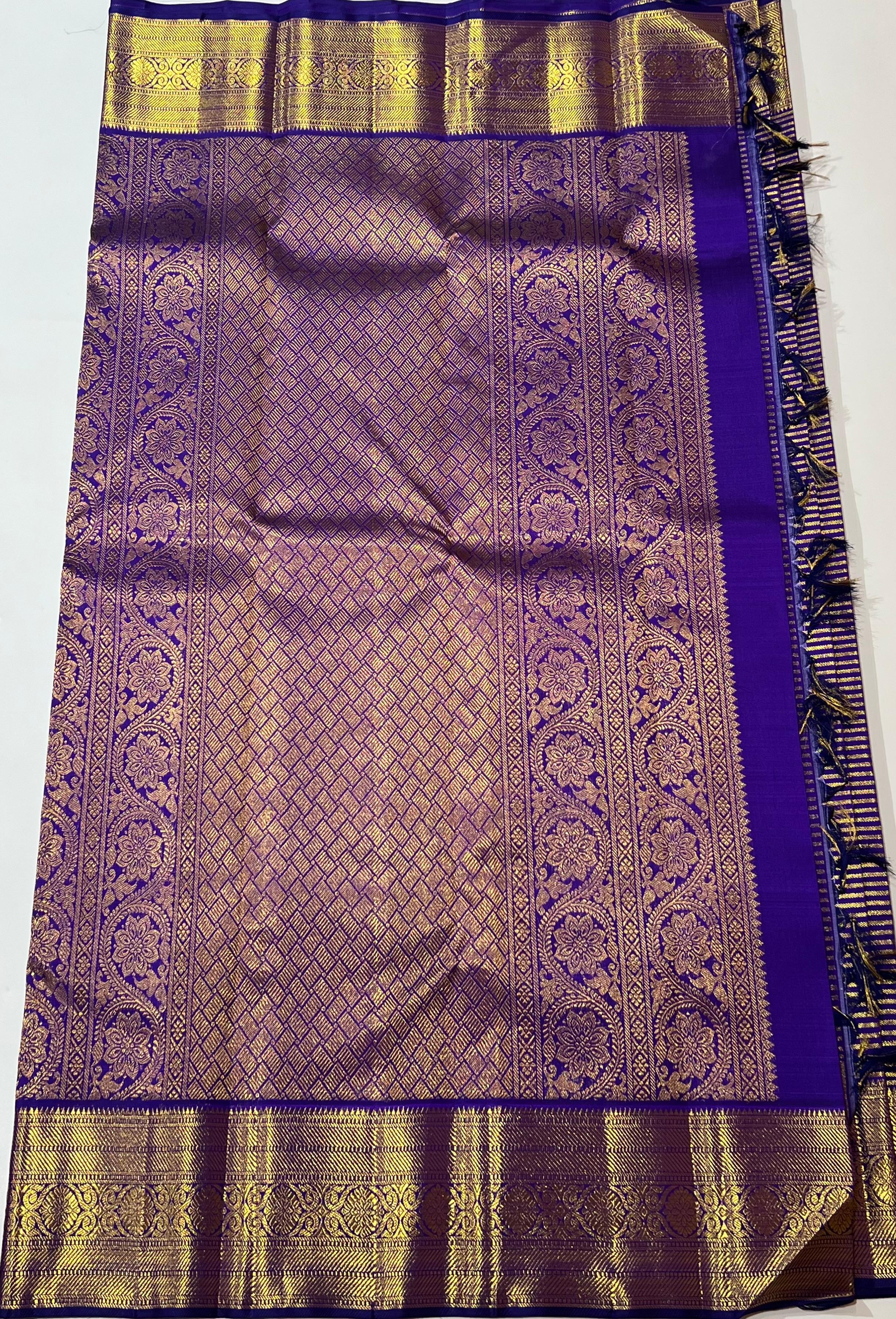Golden zari lines on Blue kanjeevaram silk saree