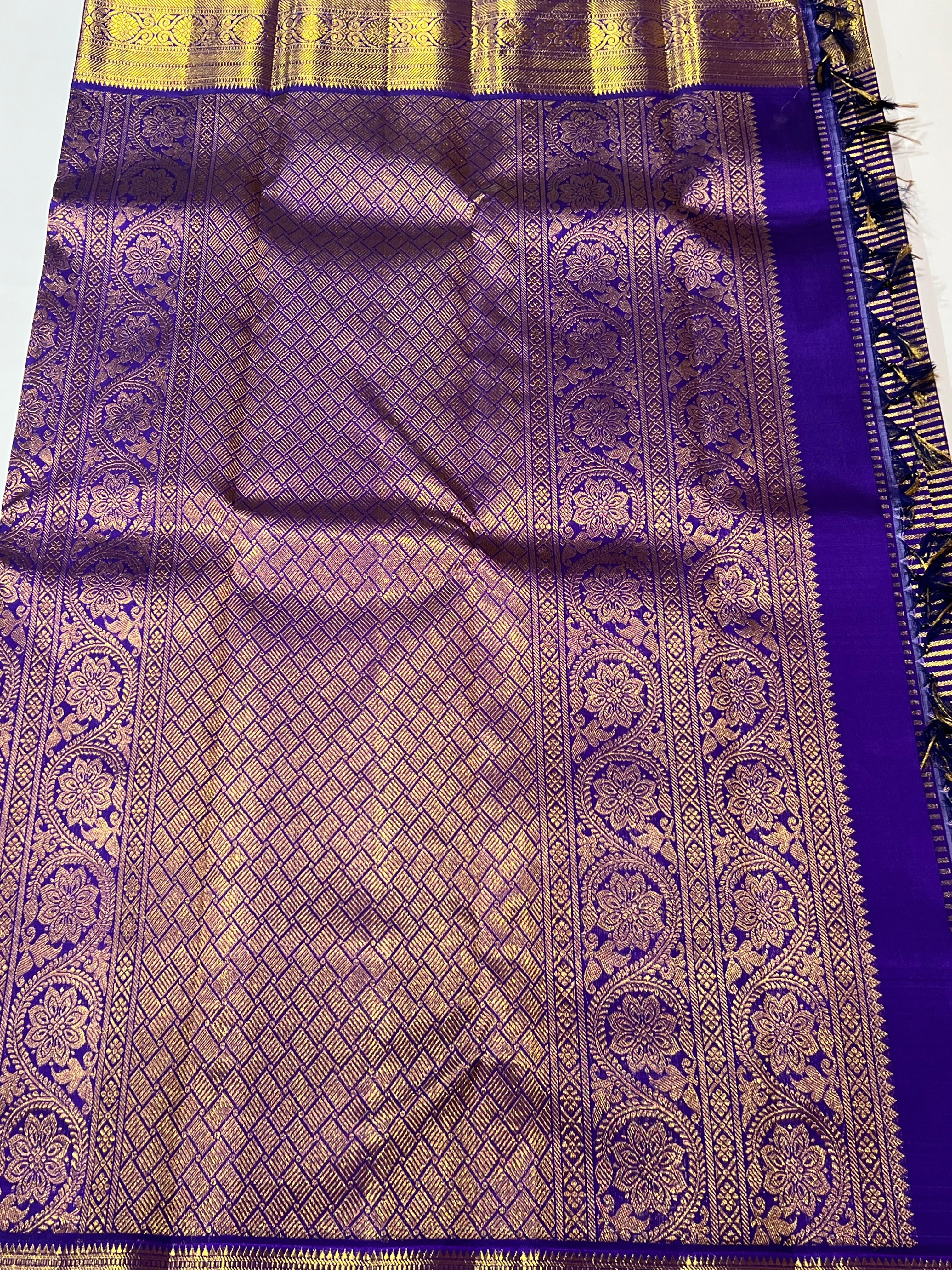 Golden zari lines on Blue kanjeevaram silk saree
