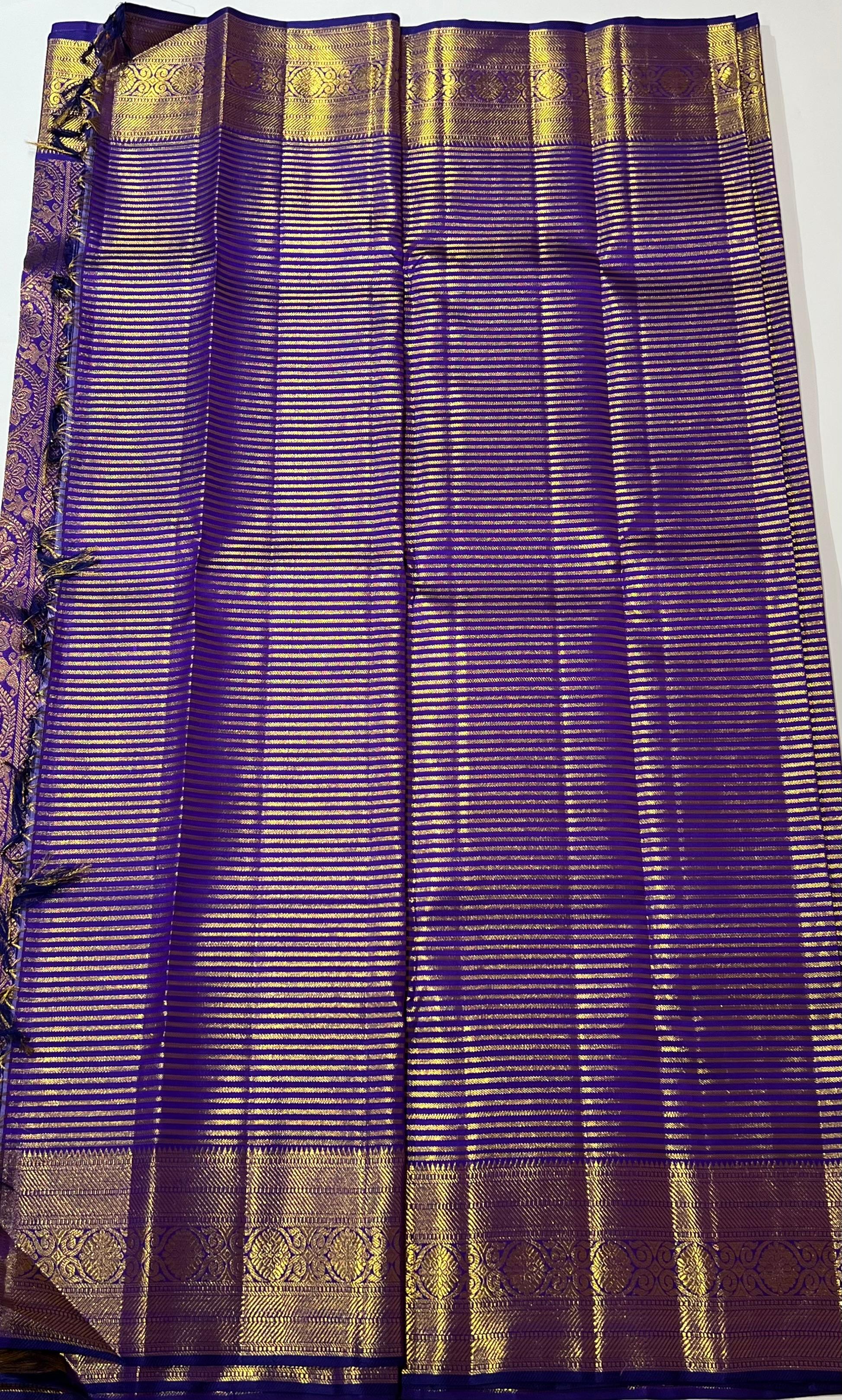 Golden zari lines on Blue kanjeevaram silk saree