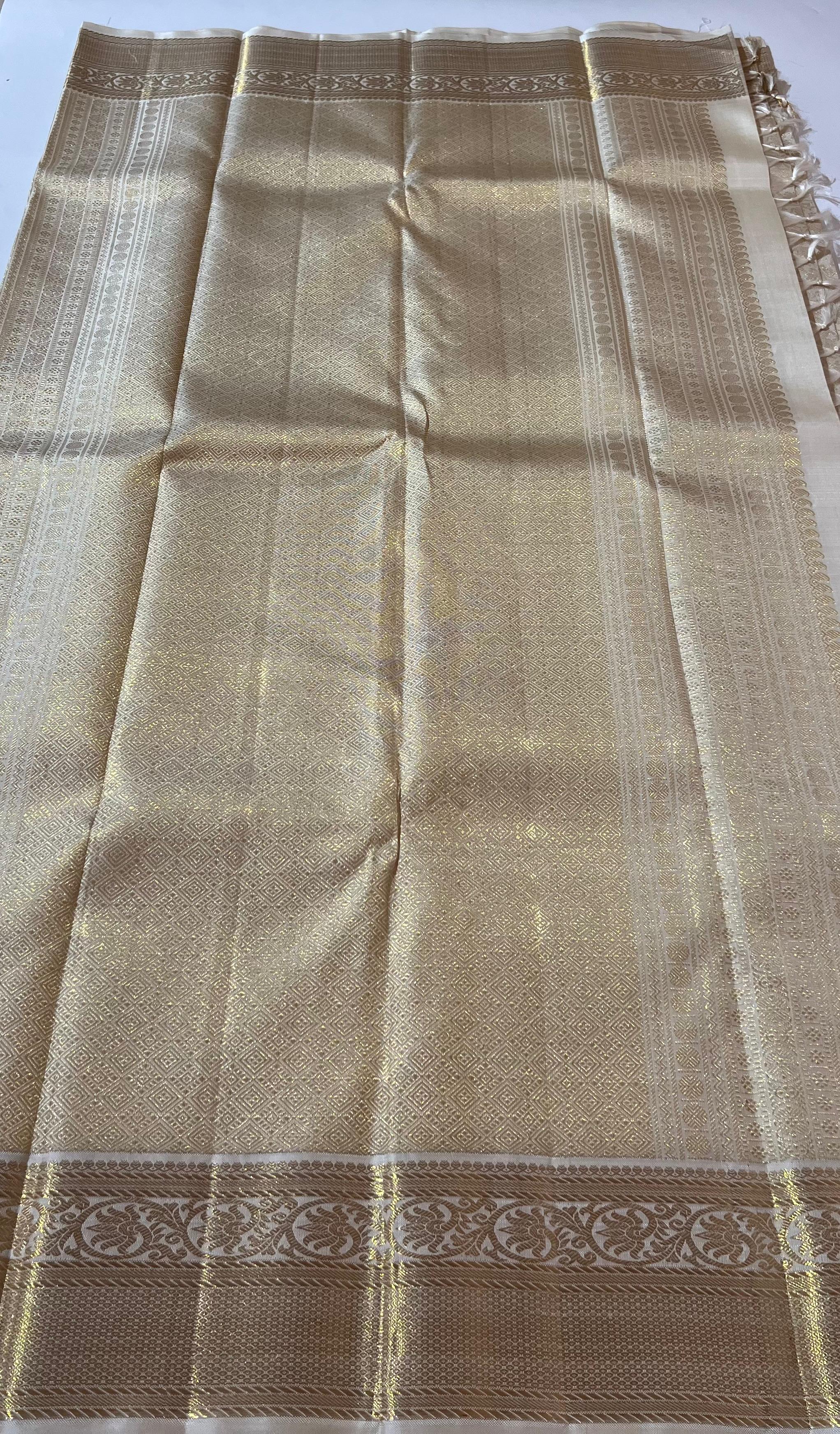 White and golden Kanjeevaram silk saree