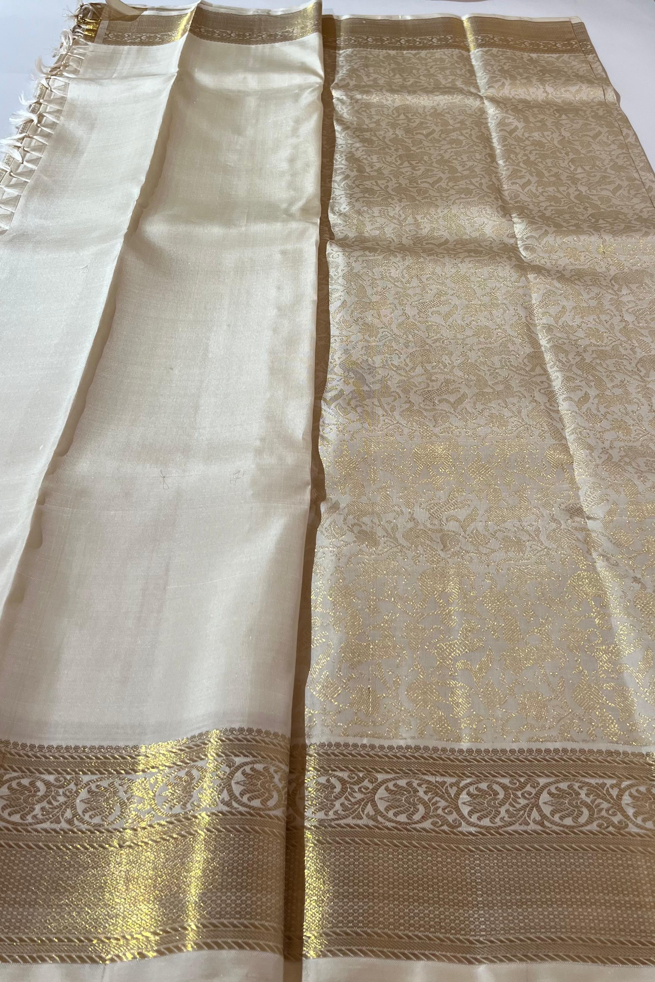 White and golden Kanjeevaram silk saree