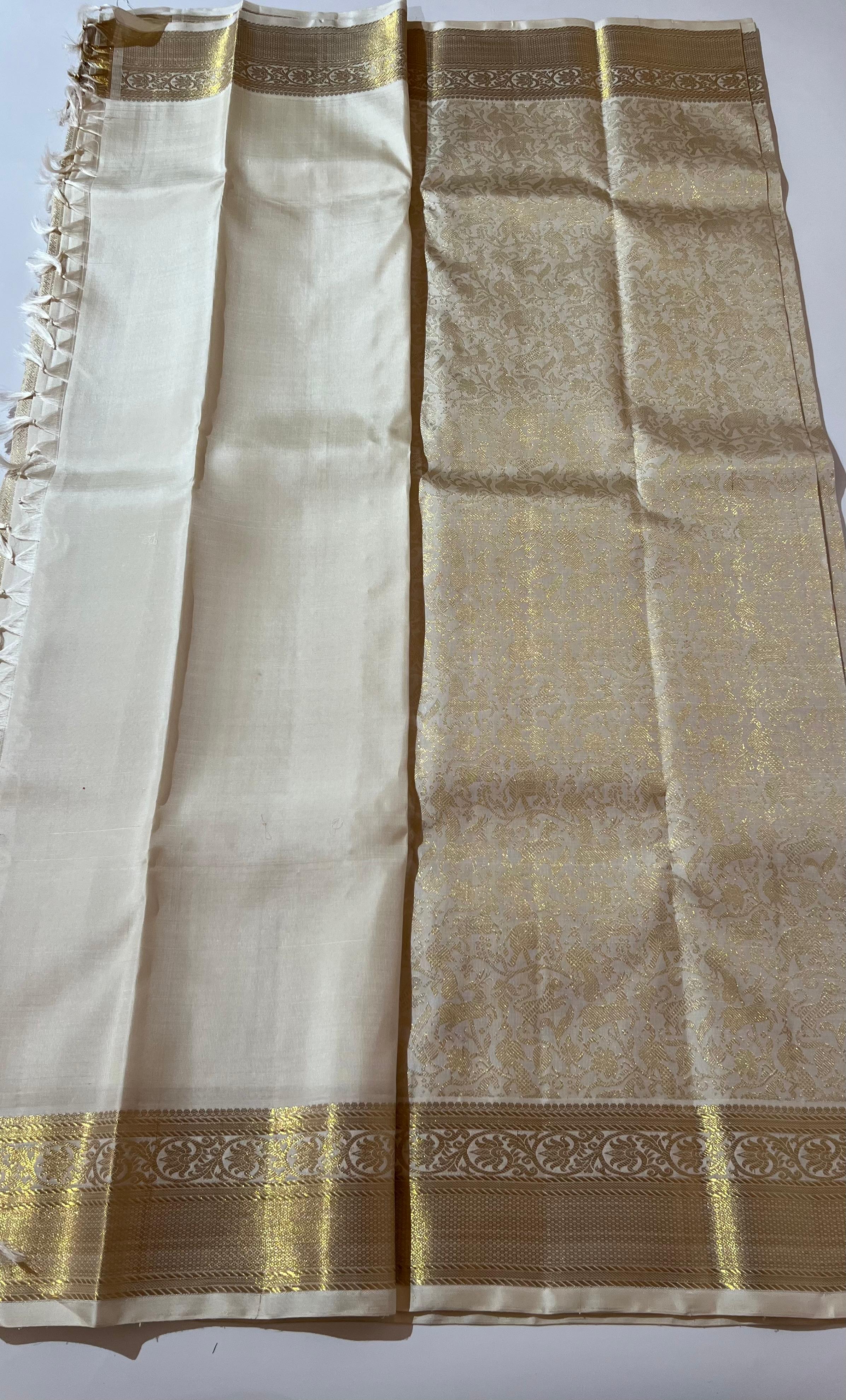 White and golden Kanjeevaram silk saree