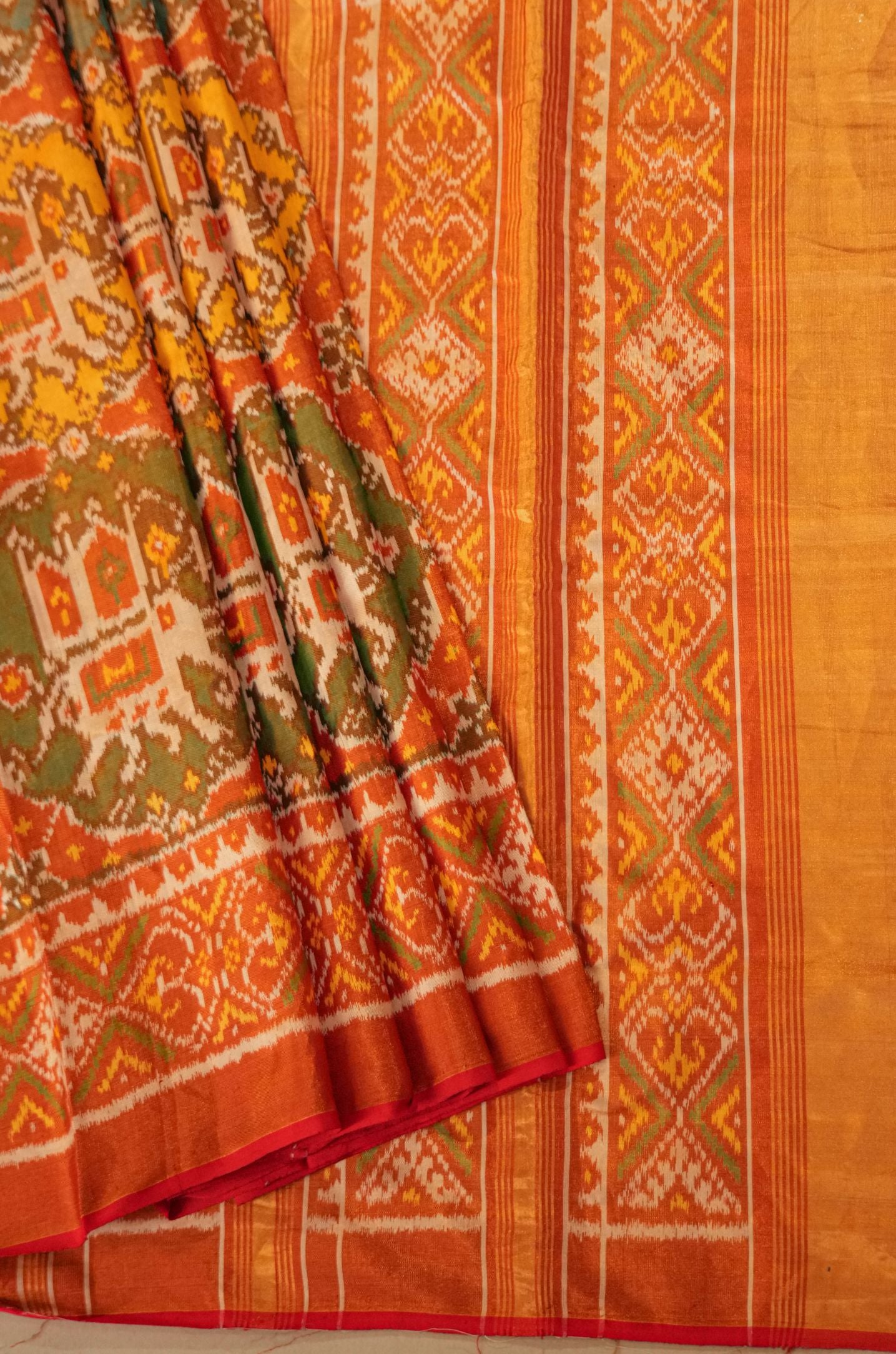 Gajaraj Blue & Yellow Tissue Patola Saree