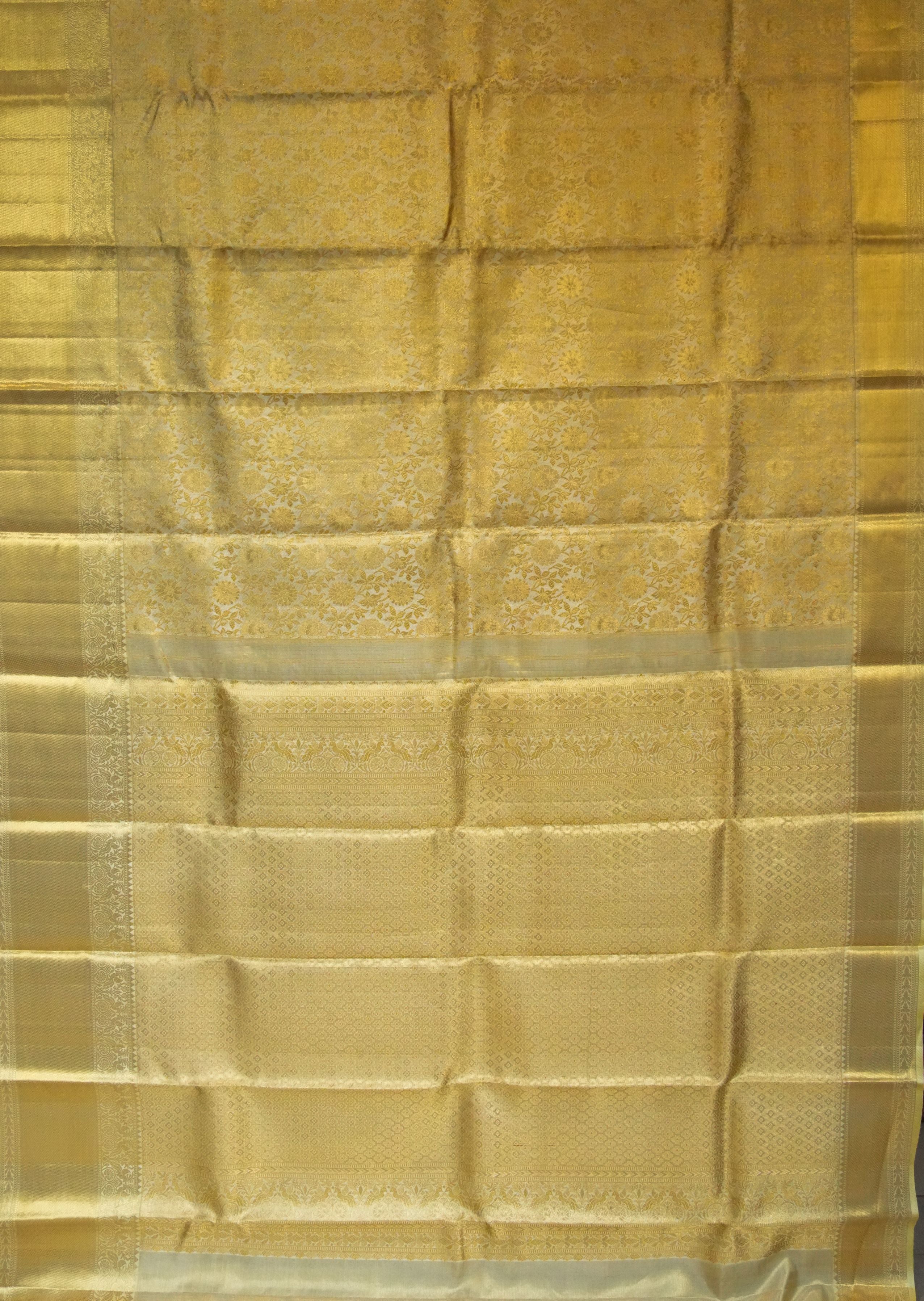 Kavacha Gold Tissue Floral Saree