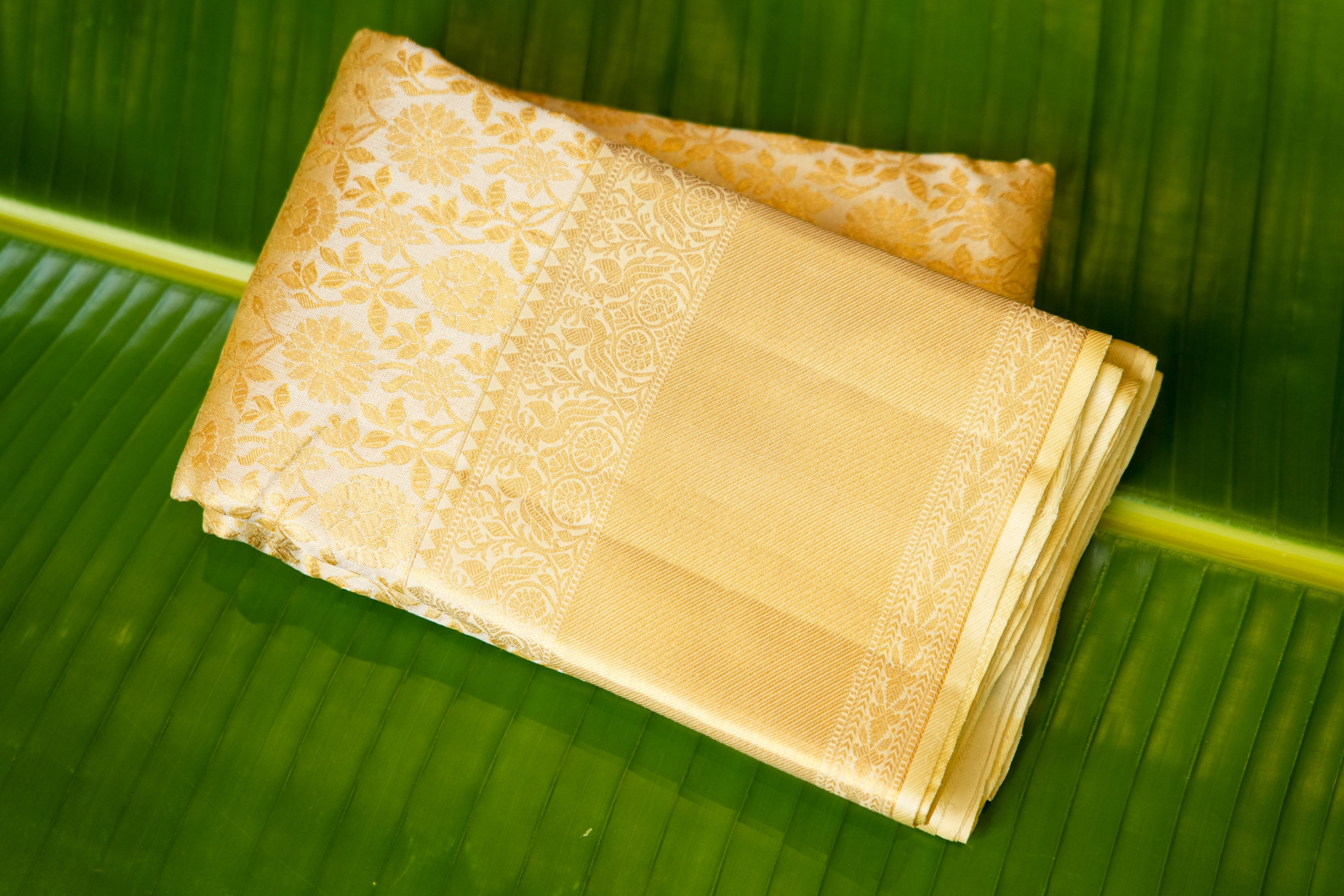 Kavacha Gold Tissue Floral Saree