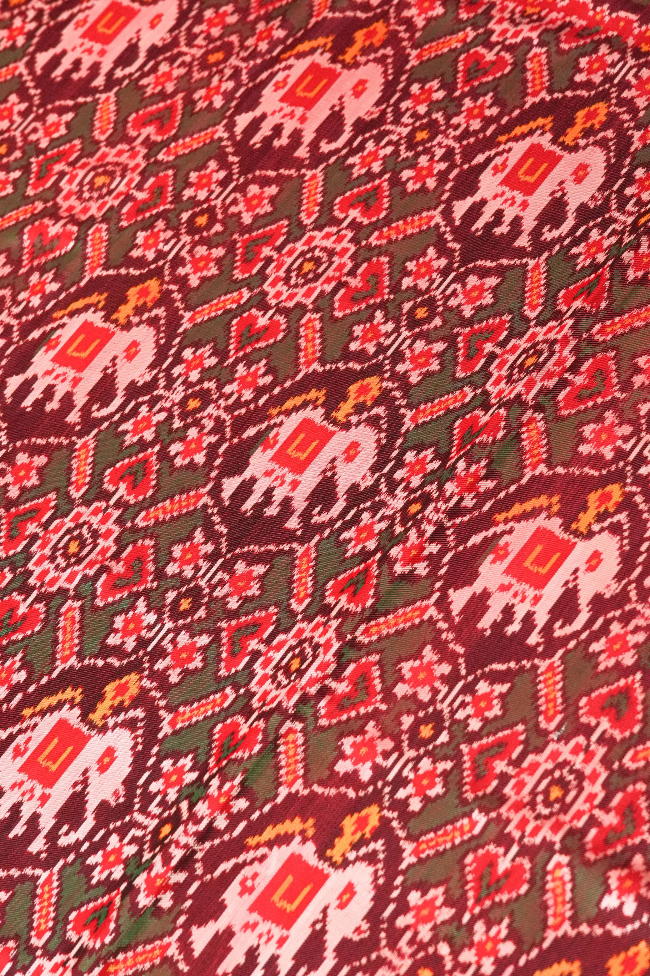 Aranyam Red and Maroon Twill Patola Saree