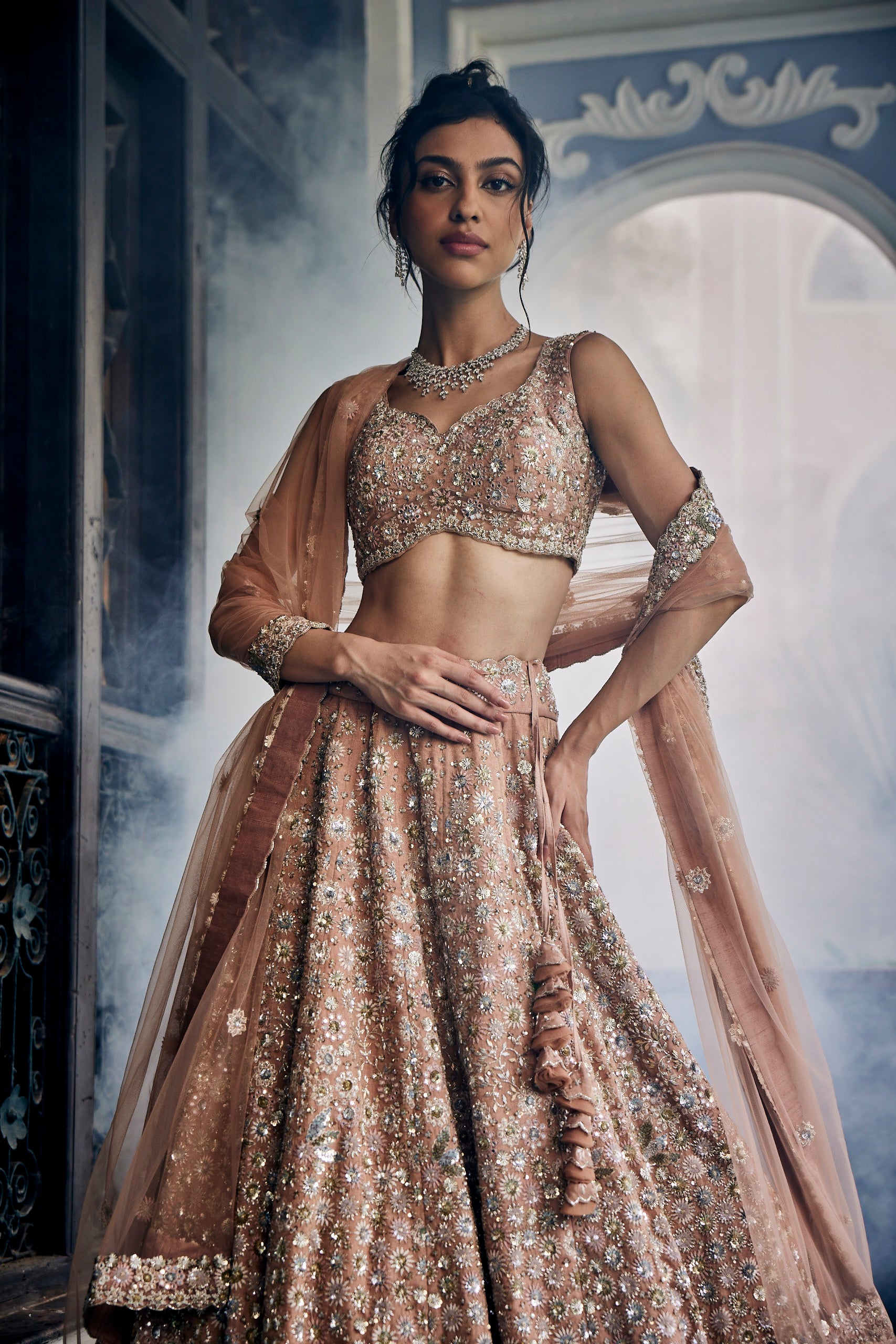 Tyehe Gold tissue lehenga set