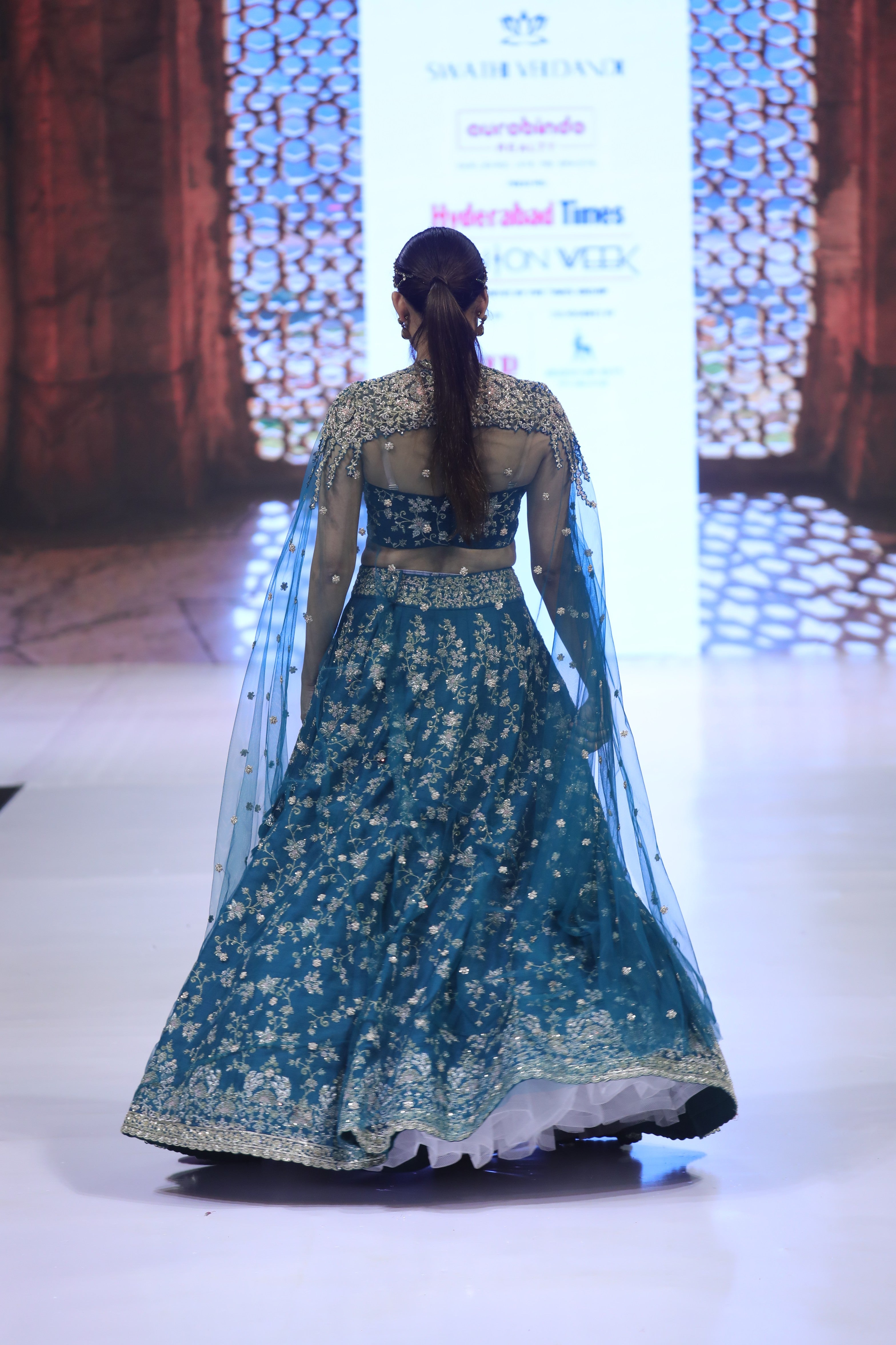 Starlit Teal green cape Lehenga set