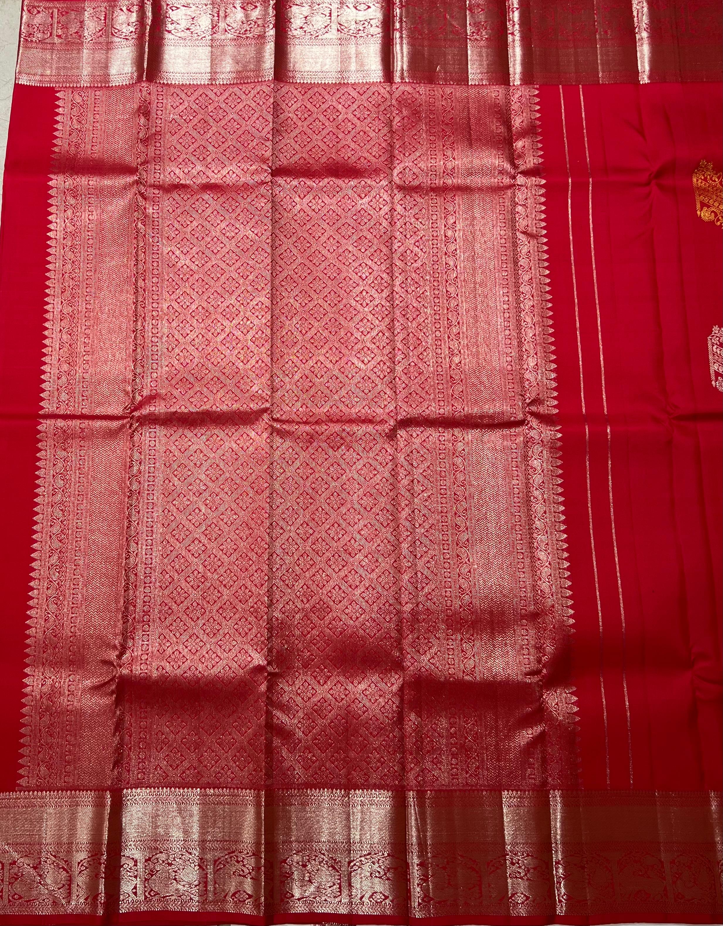 Red and silver zari Kanjeevaram silk saree