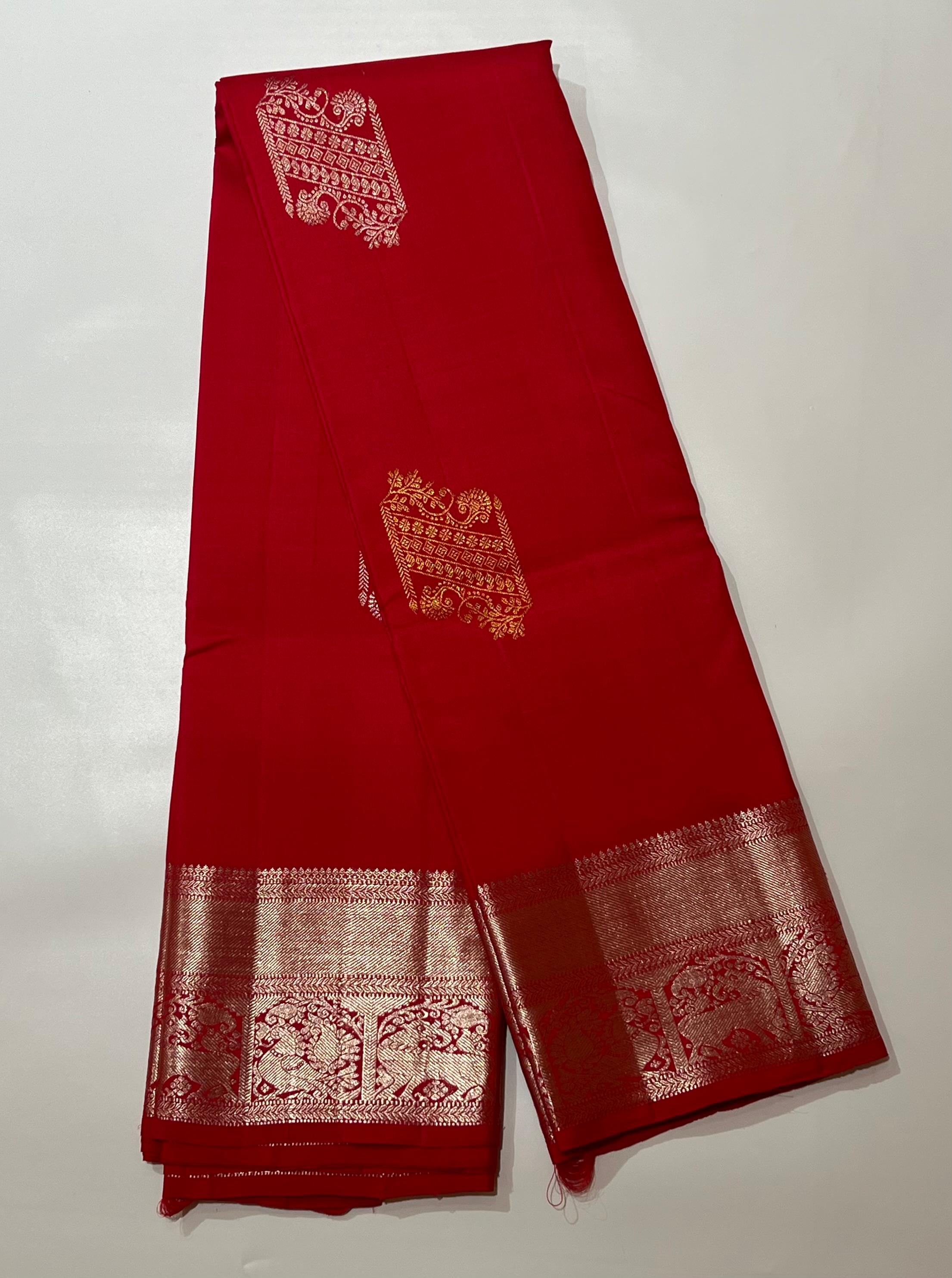Red and silver zari Kanjeevaram silk saree