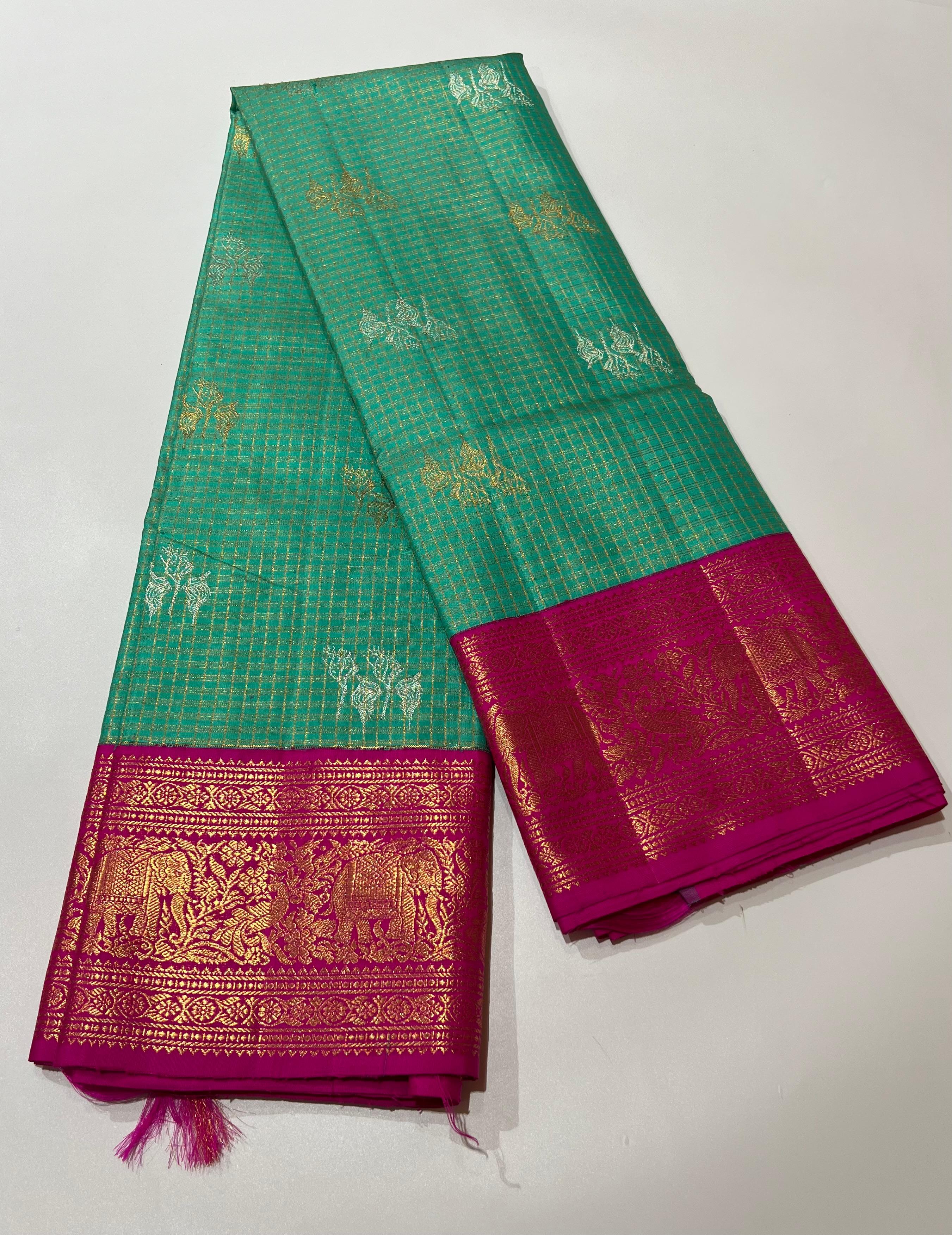 Check pattern on green and pink kanjeevaram silk saree