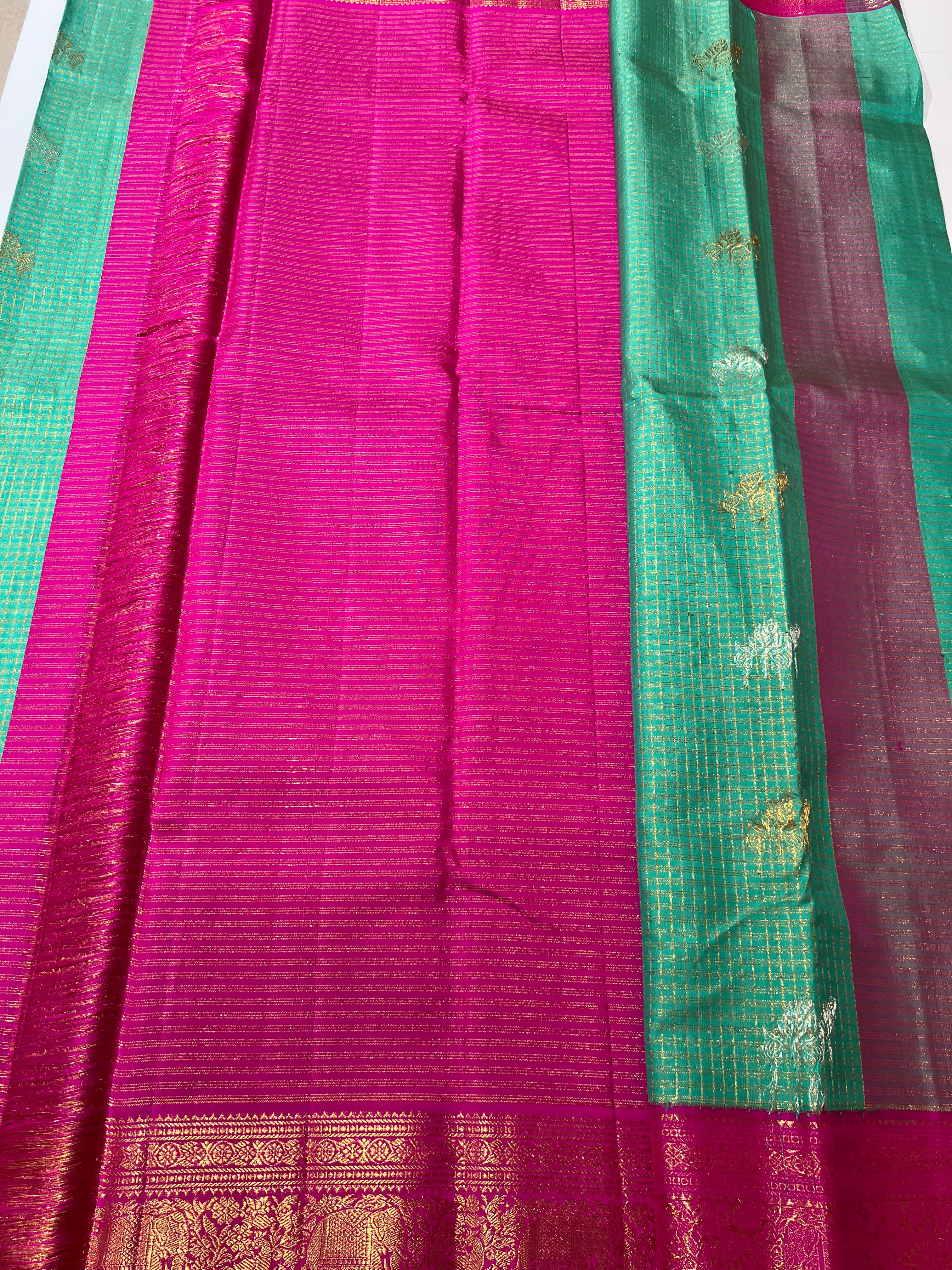 Check pattern on green and pink kanjeevaram silk saree