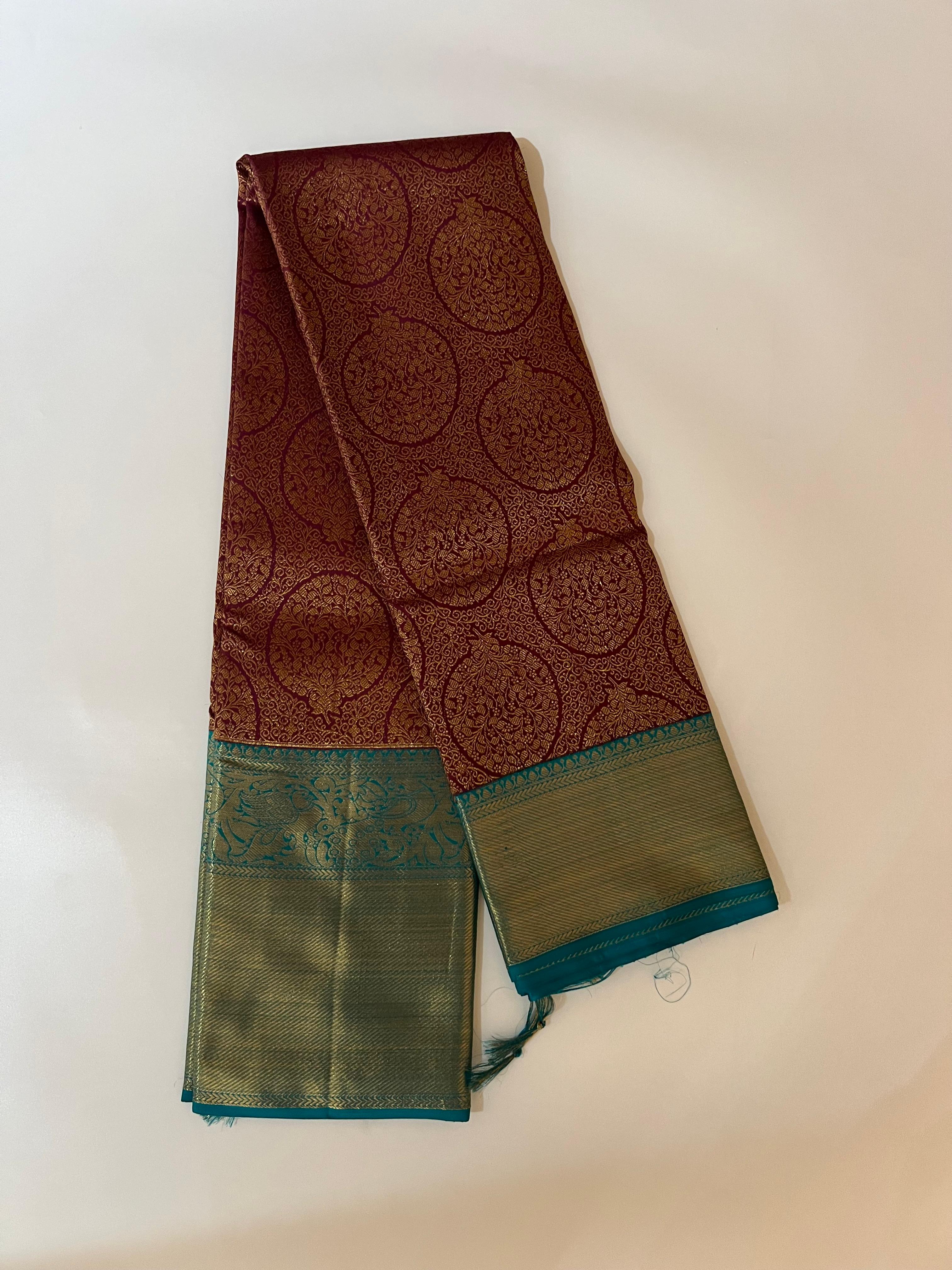 Burgundy and persian Green kanjeevaram silk saree