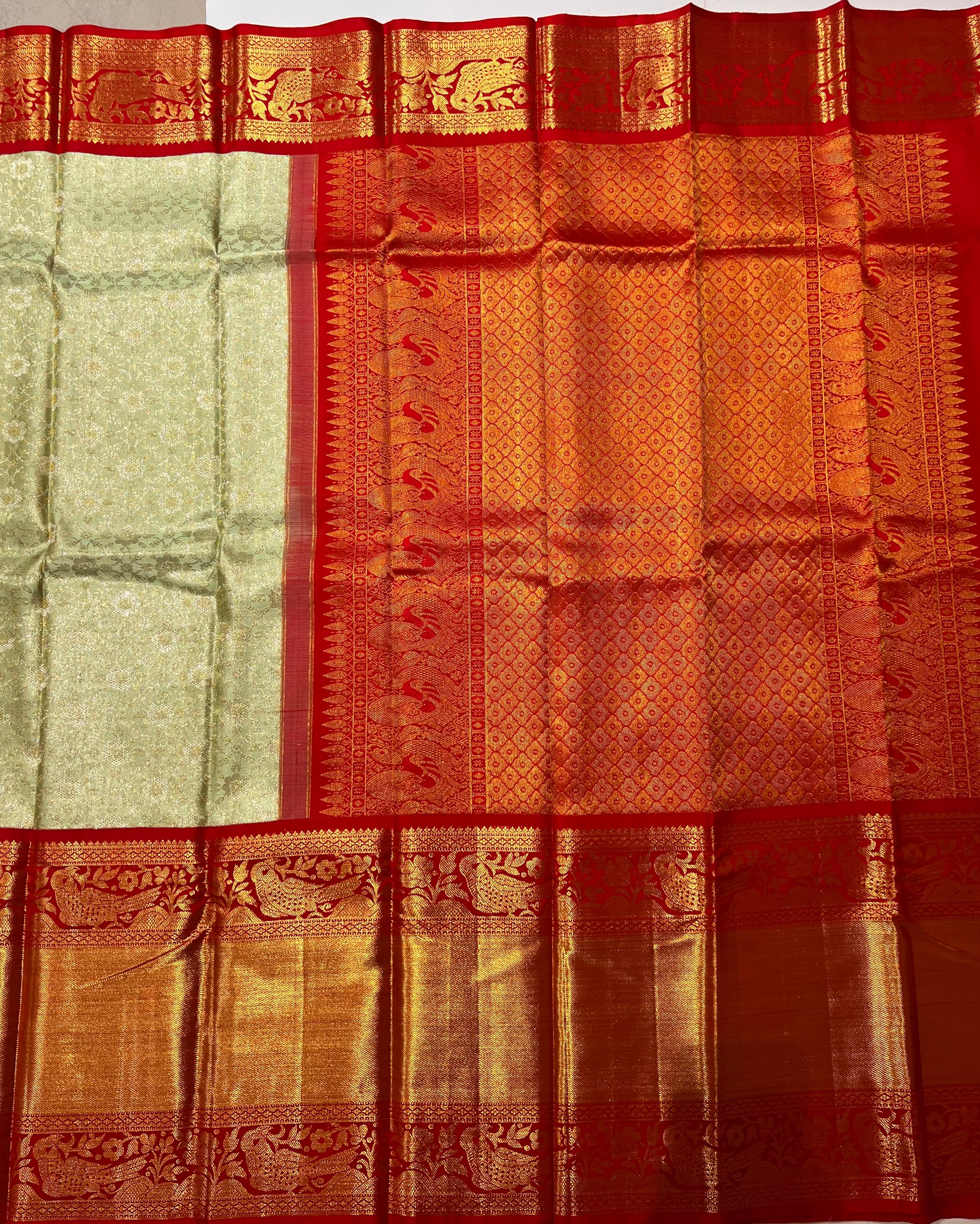 Light green and gorgeous red Kanjeevaram silk saree