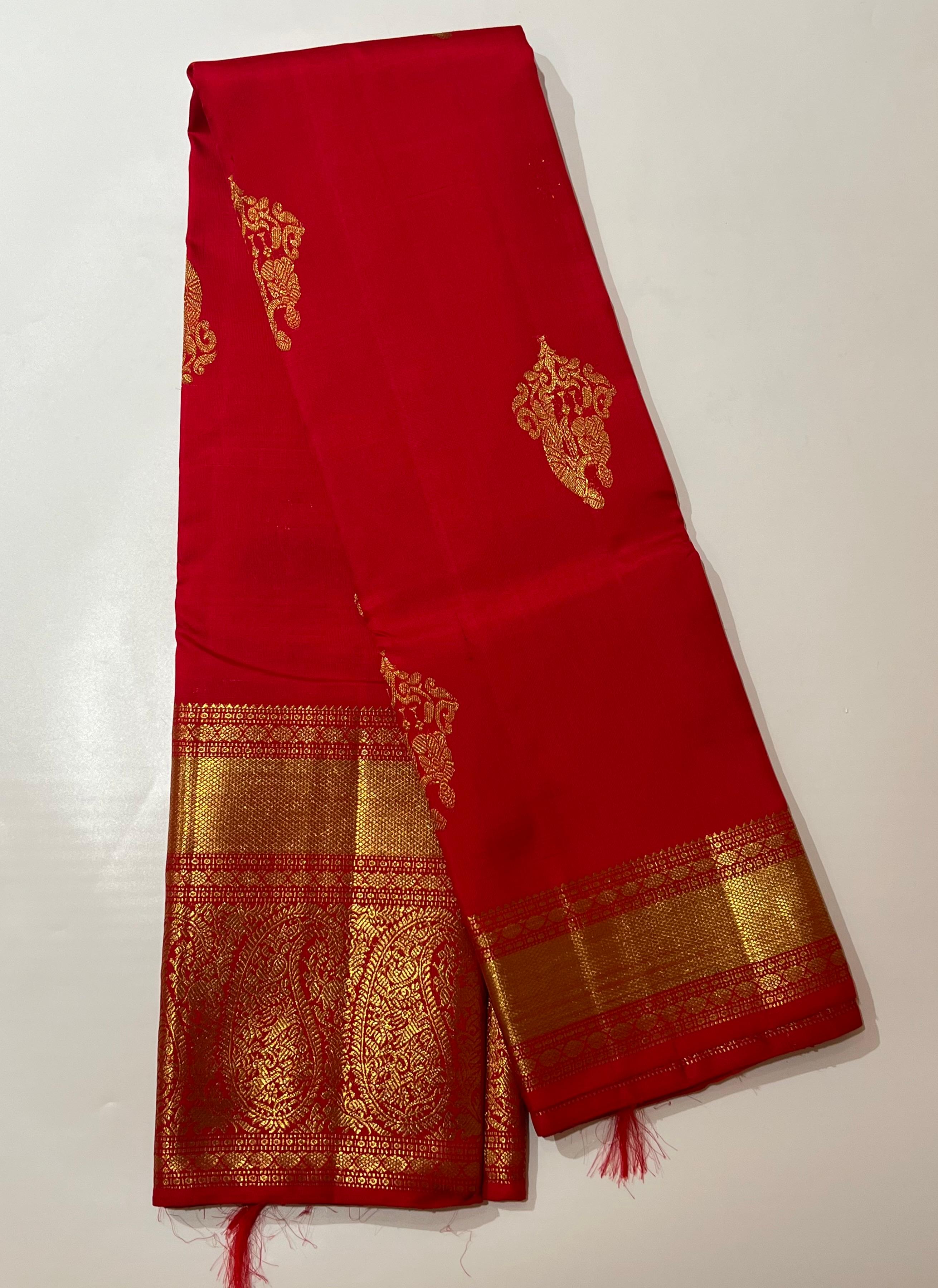 Floral butis Butis Red and golden Kanjeevaram saree