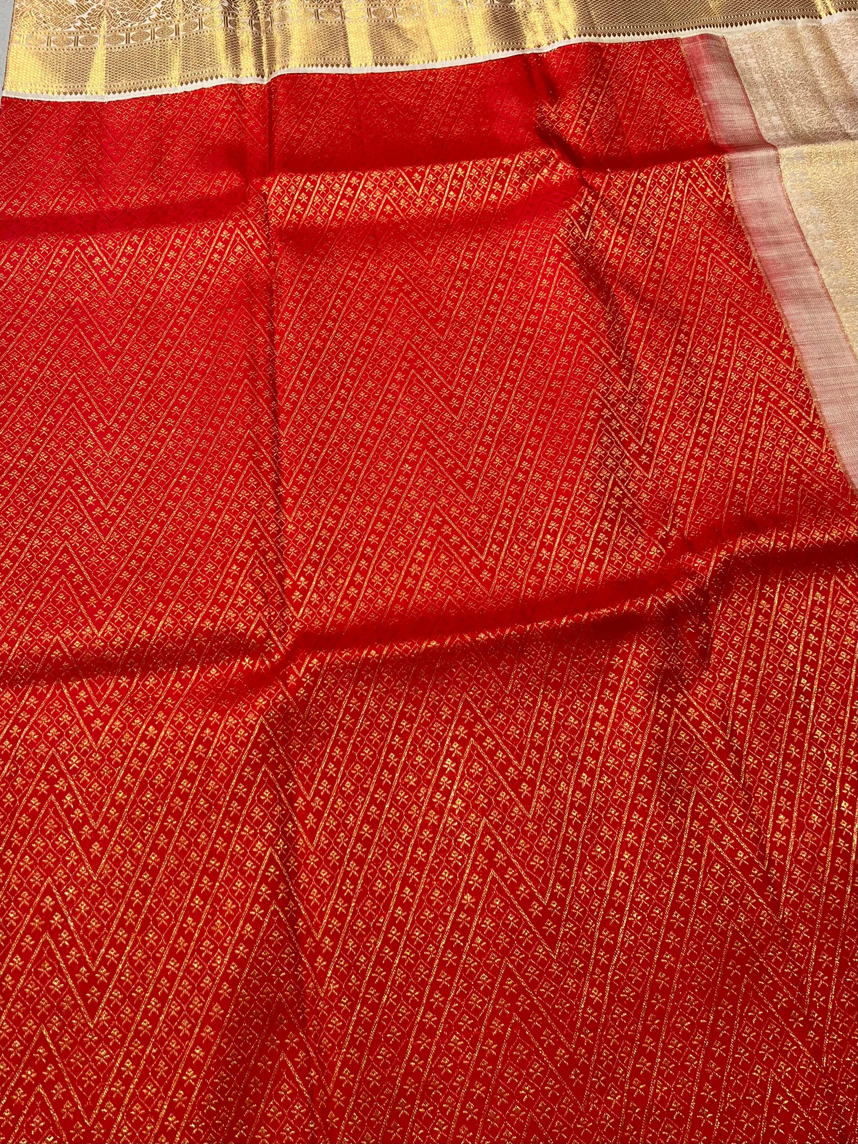Red and white golden zari Kanjeevaram silk saree