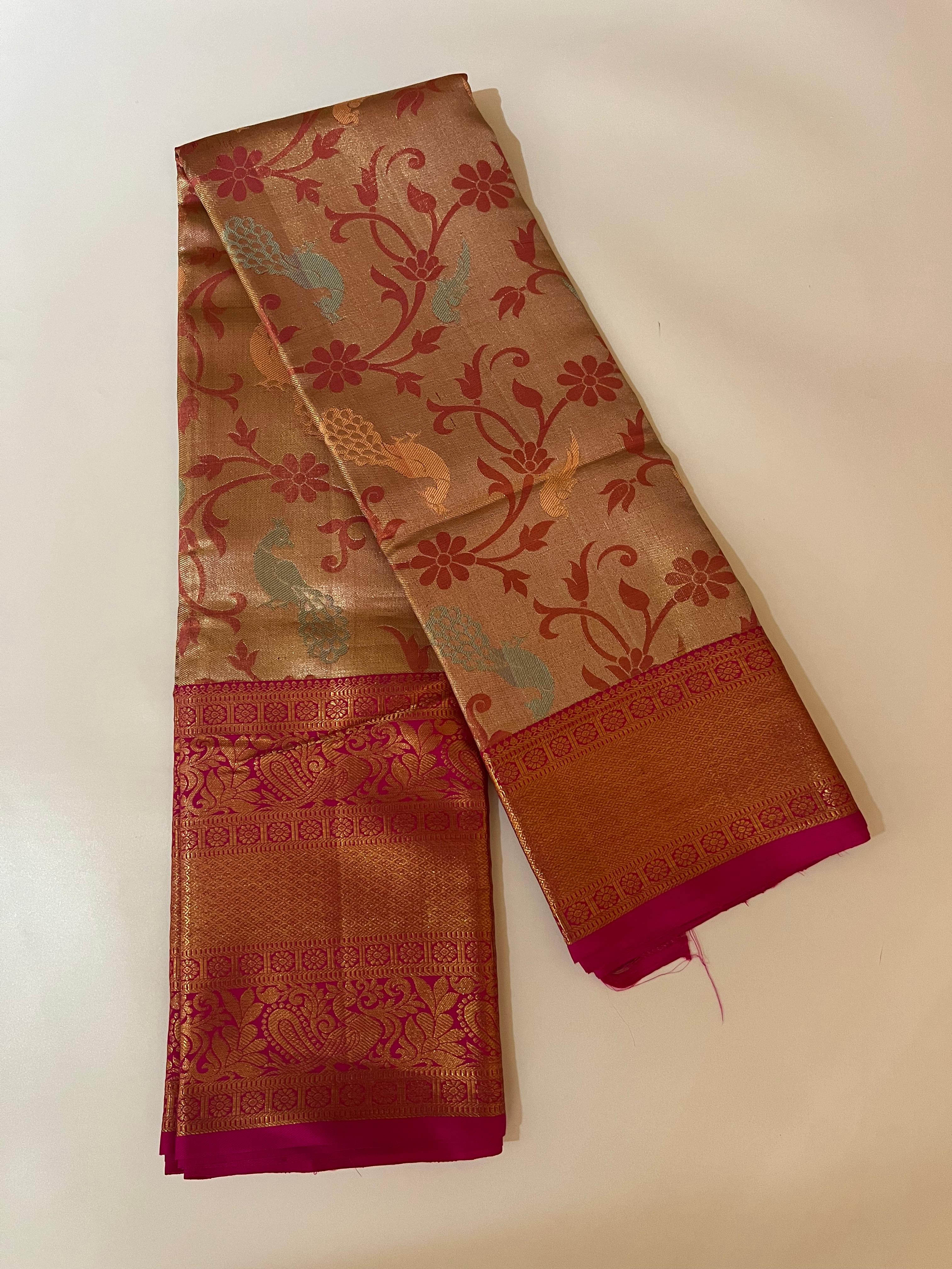 Peacock motif Golden and rani pink Kanjeevaram silk saree