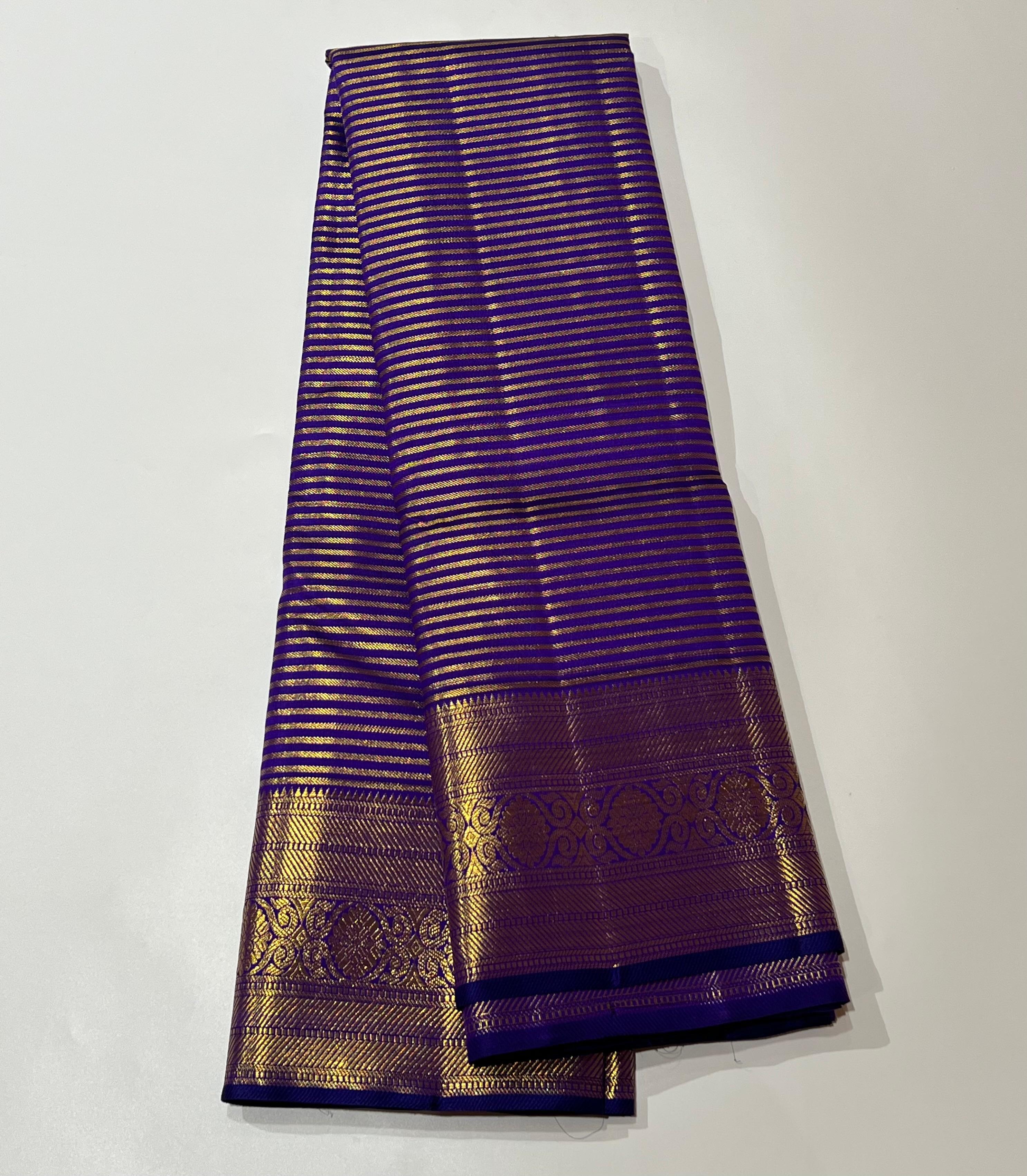 Golden zari lines on Blue kanjeevaram silk saree
