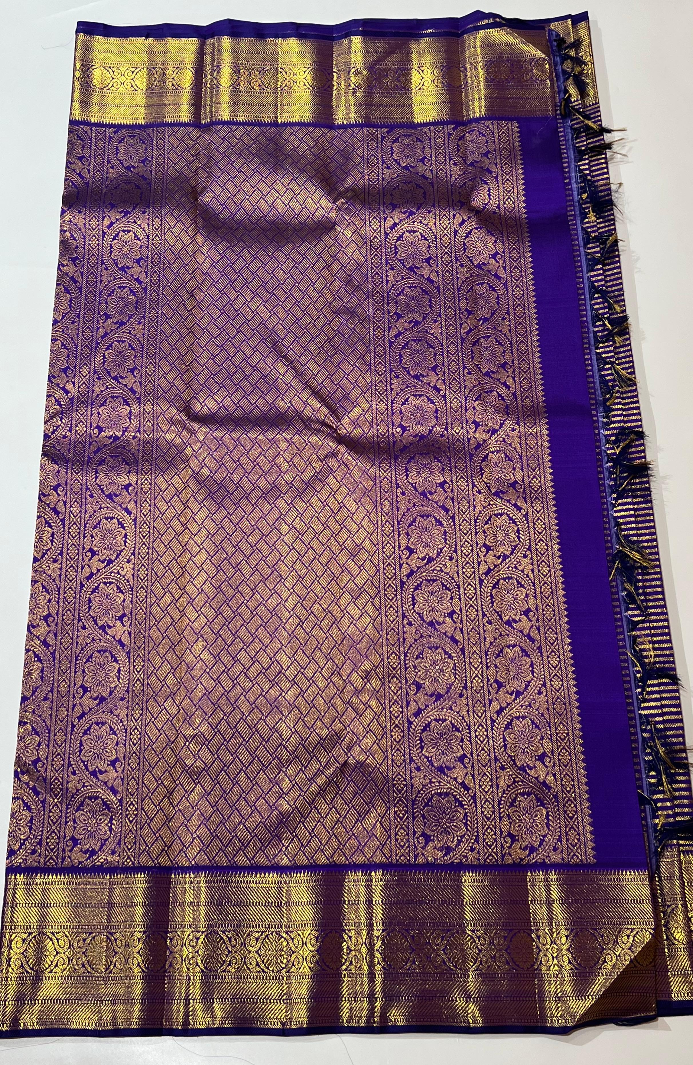 Golden zari lines on Blue kanjeevaram silk saree