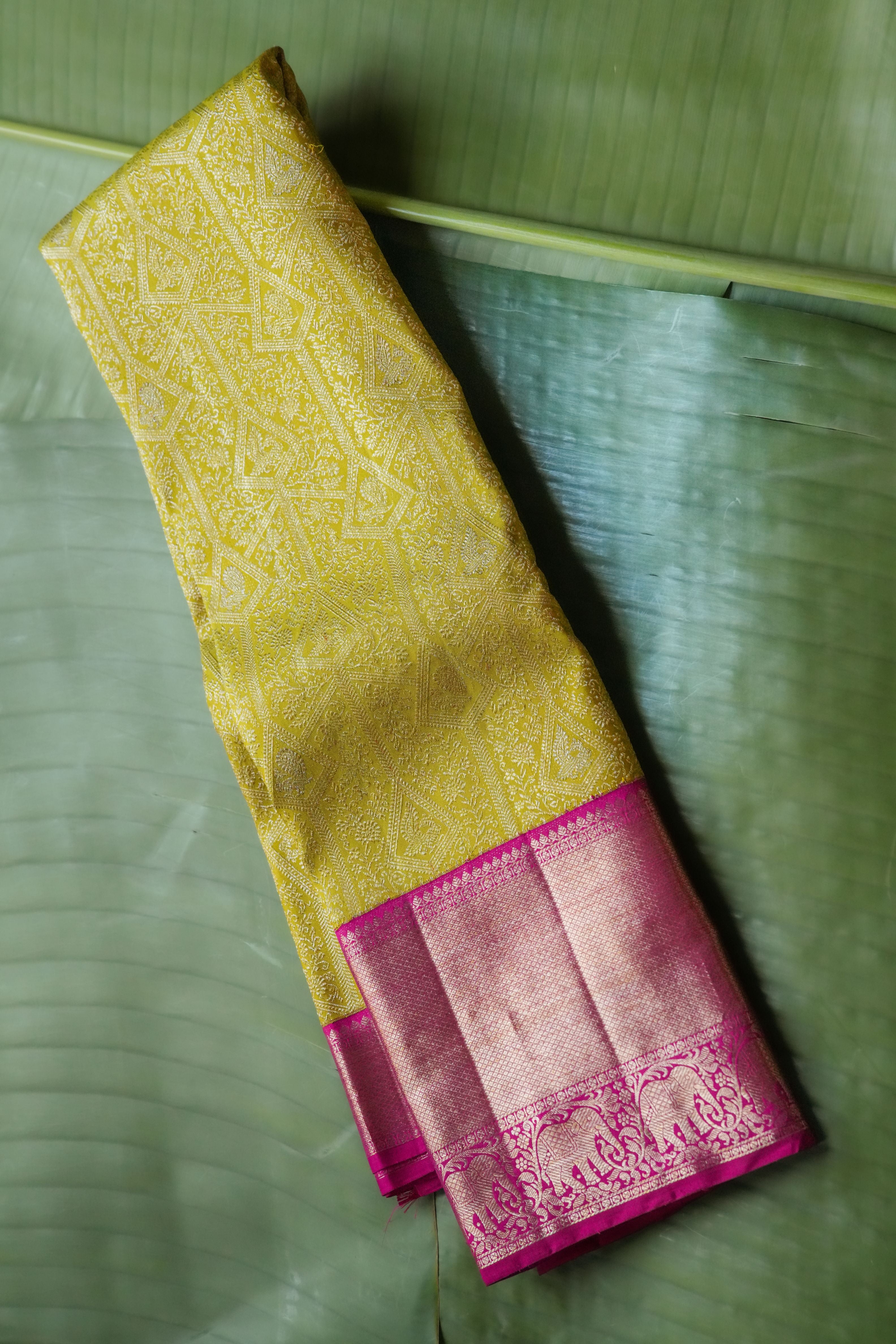Yellow Gold Kanchi Pattu saree with Pink border